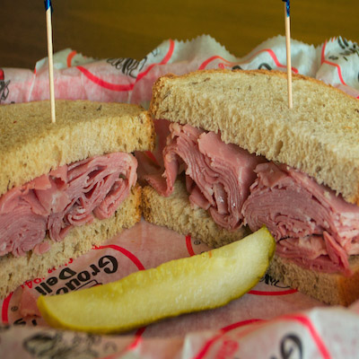 Order *Corned Beef Sandwich food online from Groucho's Deli store, Spartanburg on bringmethat.com