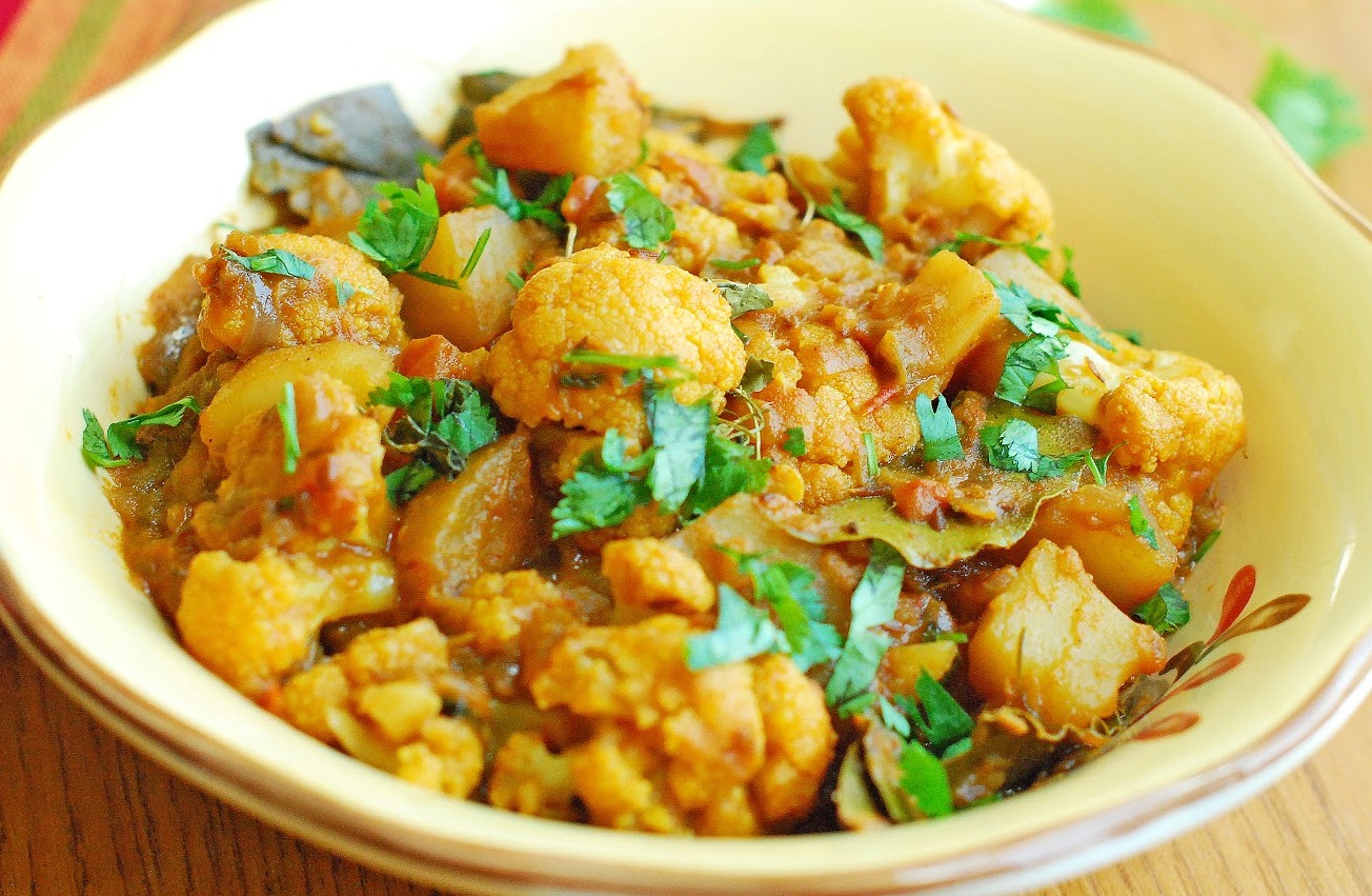 Order Aloo Gobi (Add Rice, Naan, Puri in 1) food online from Biryani Pointe store, Lombard on bringmethat.com