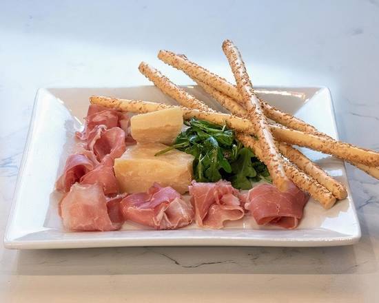 Order Prosciutto di Parma, Parmigiano Reggiano, Rucola & Crisini Platter food online from Kinzie Chophouse store, Chicago on bringmethat.com