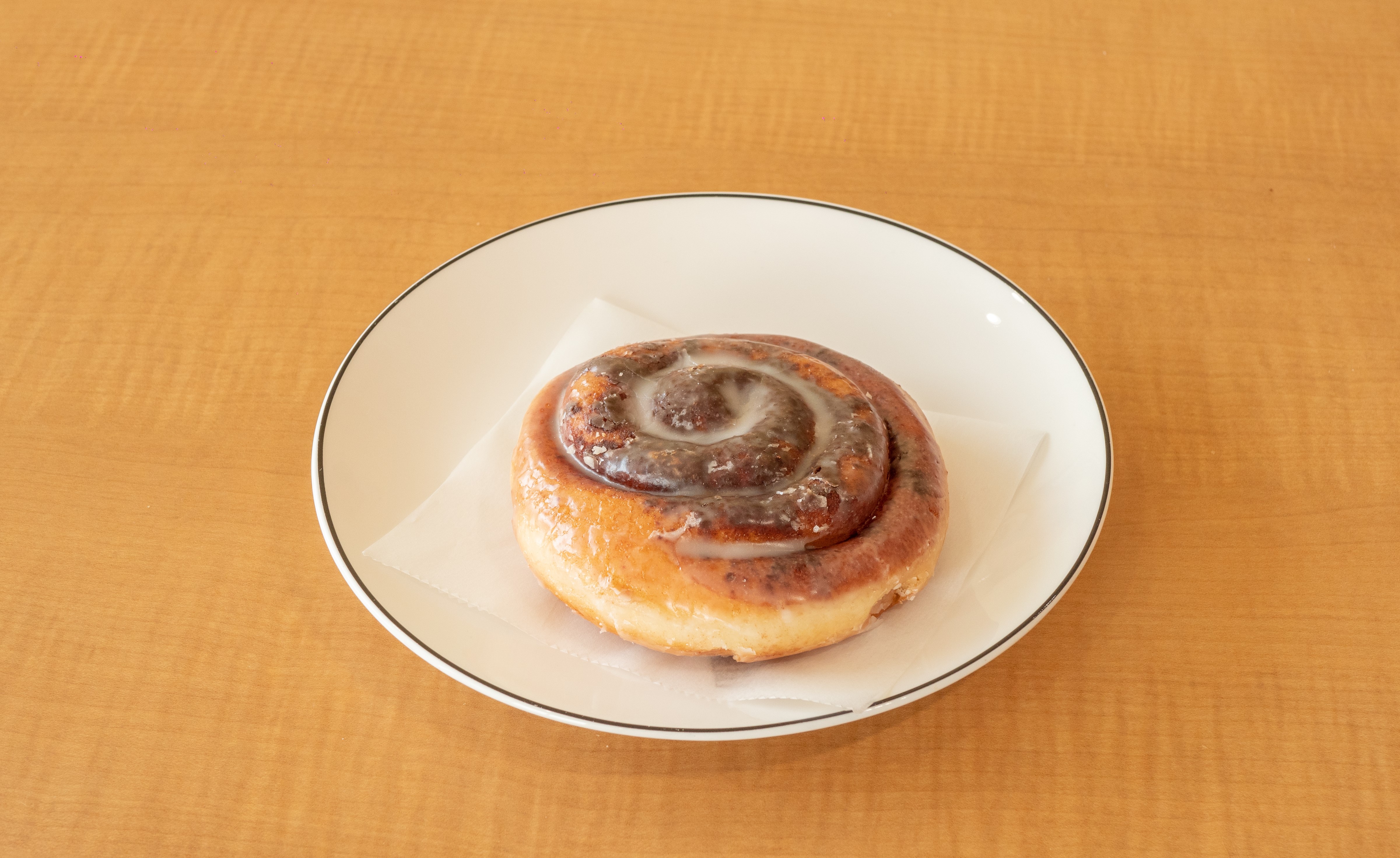 Order 1 Piece Cinnamon Roll food online from Sara Donuts store, Euless on bringmethat.com