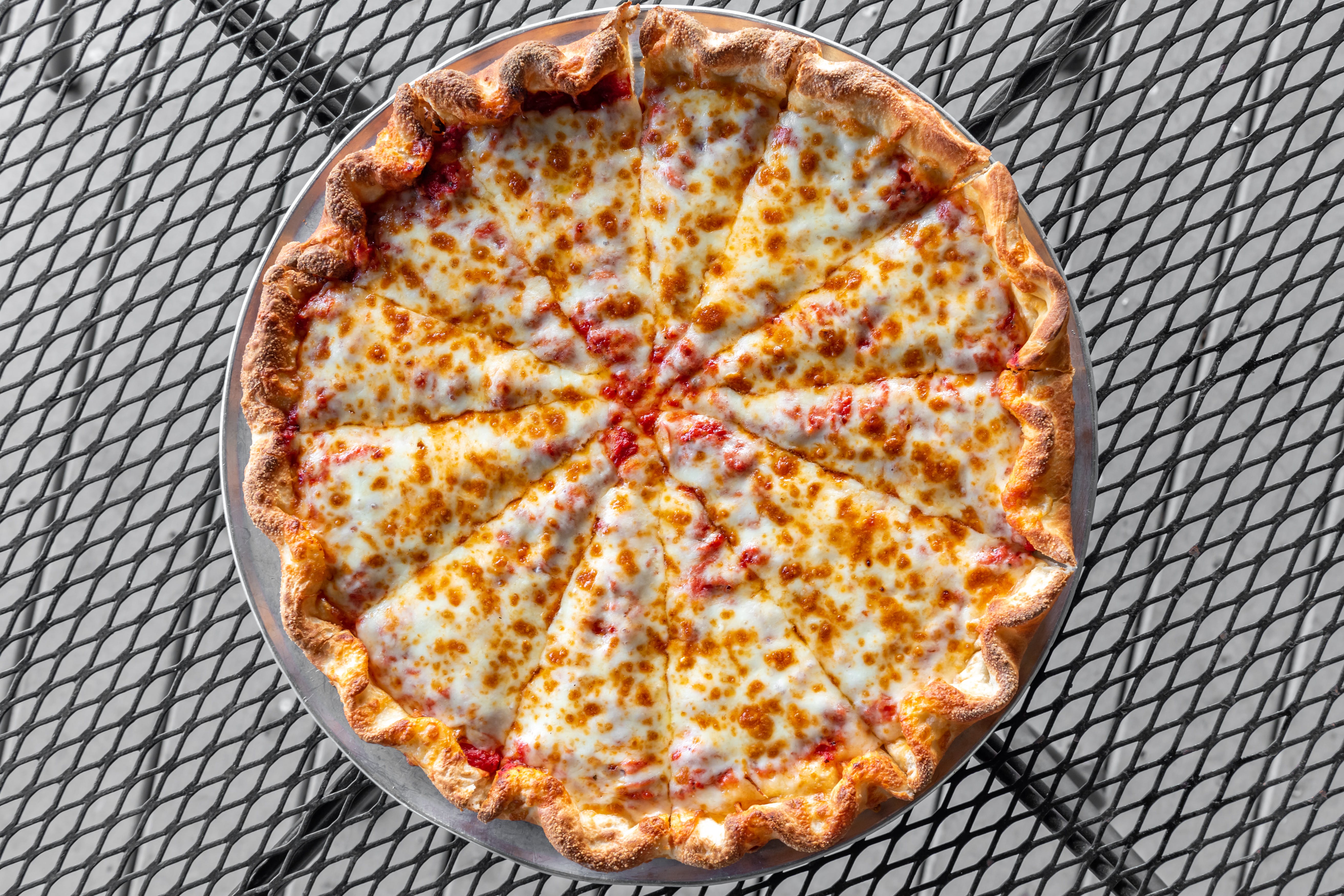 Order Cheese Pizza - Small 10" (6 Slices) food online from Giovanni Pizza & Sports Pub store, Akron on bringmethat.com
