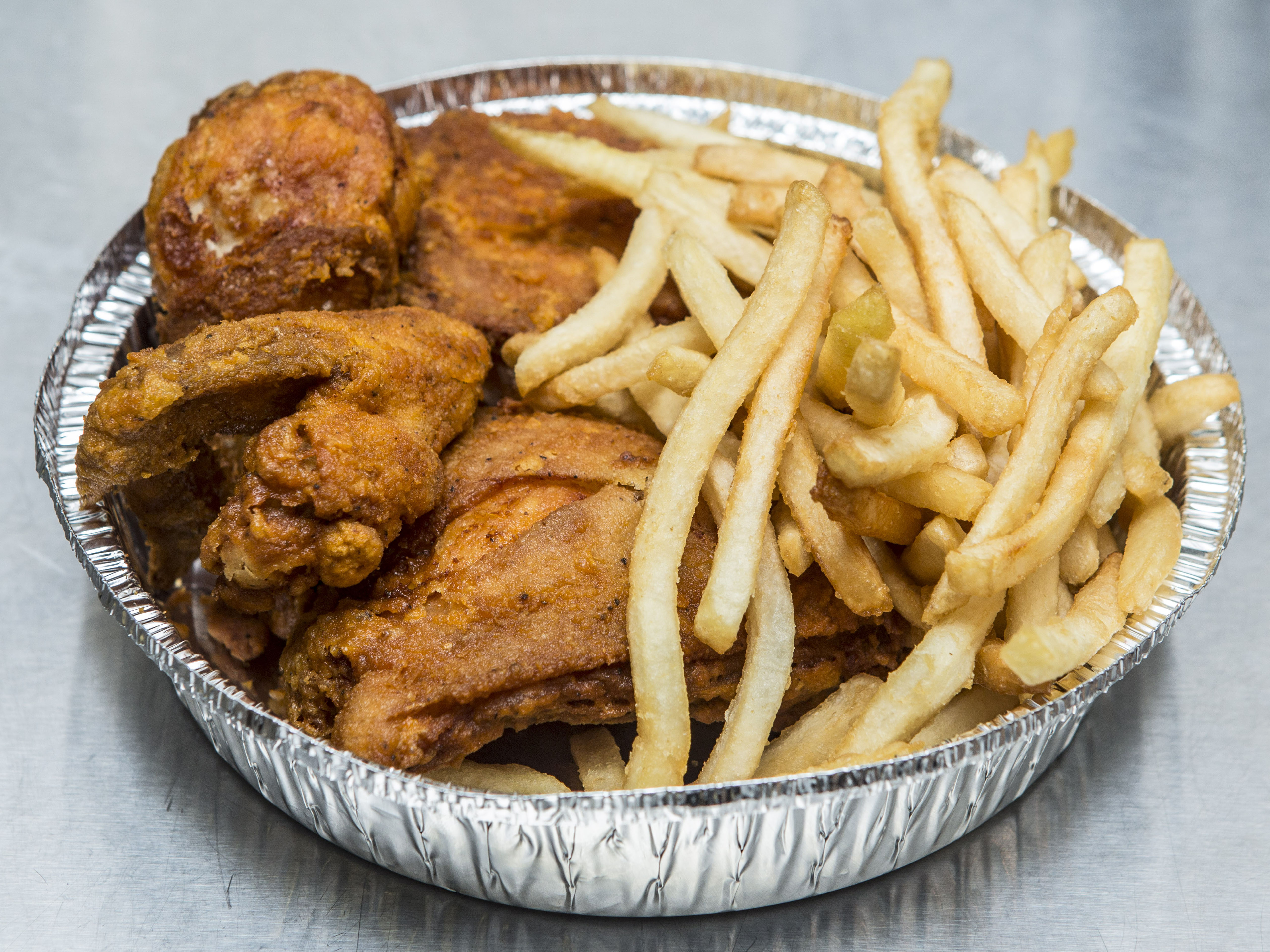 Order 23. 4 Piece Chicken Wings with Fries and Soda food online from Crown Fried Chicken store, Brooklyn on bringmethat.com