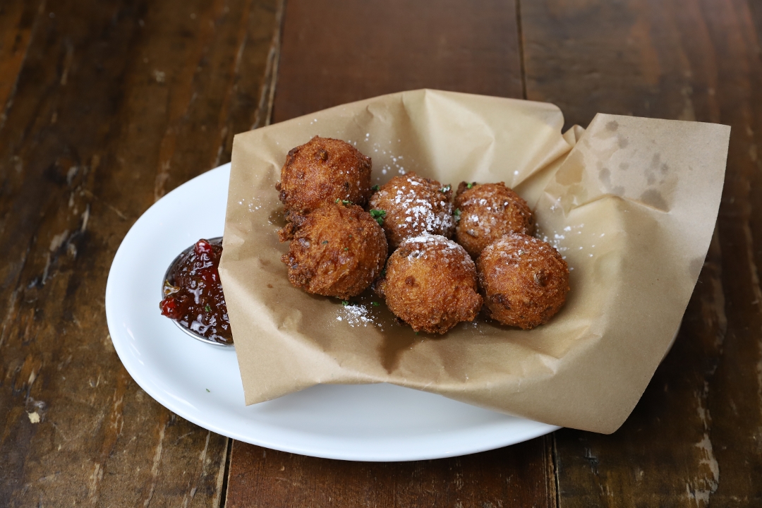 Order Beignet Style Hushpuppies food online from Plank Seafood Provisions store, Omaha on bringmethat.com