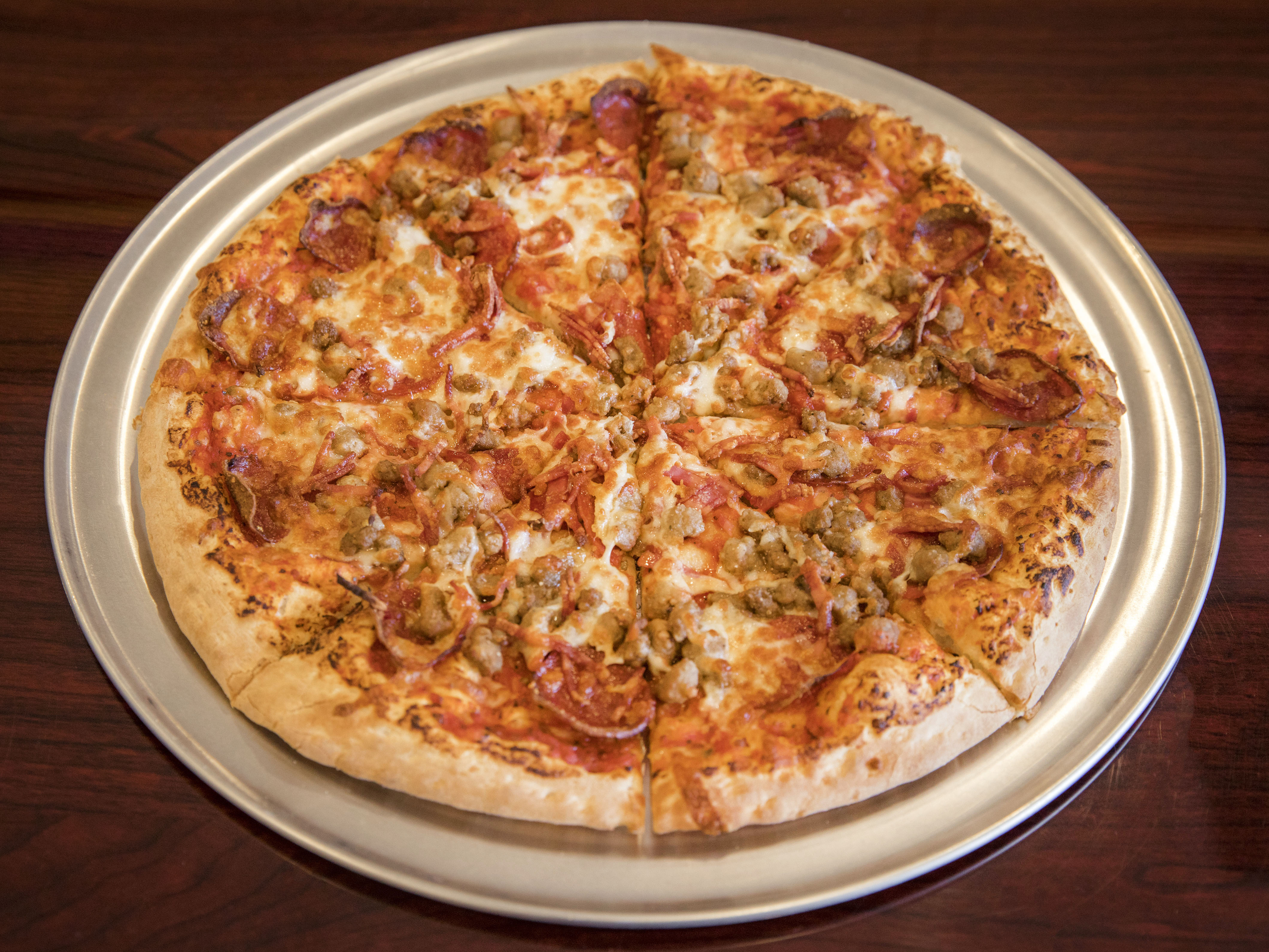 Order Meat Lovers Pizza food online from Till Five Wings store, Nashville on bringmethat.com