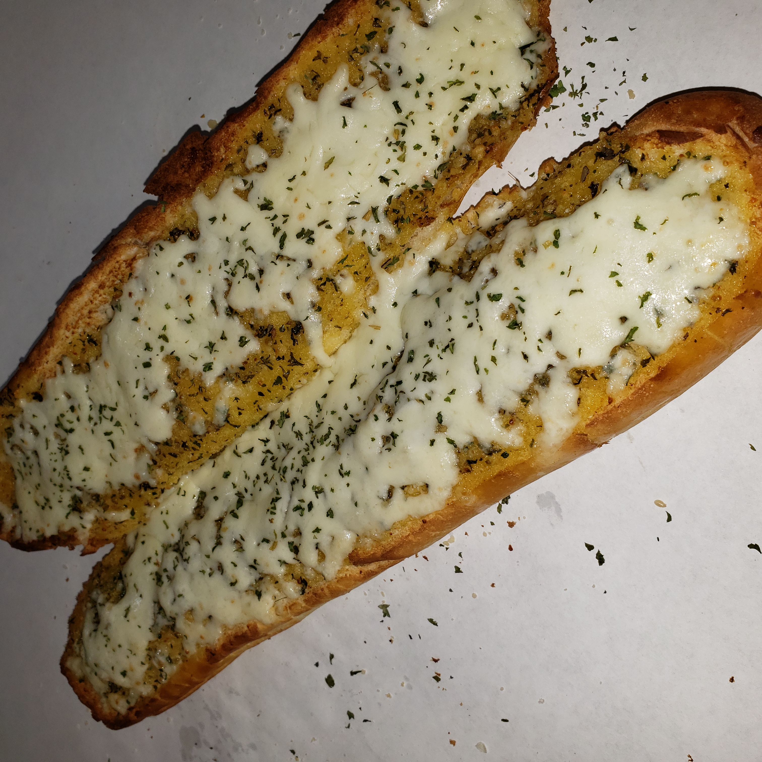 Order 12" Loaf of Garlic Bread with Cheese food online from Dan Pizza Co store, Webster on bringmethat.com