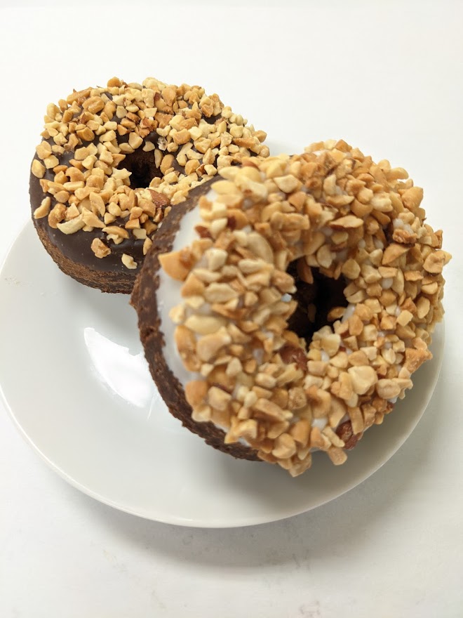 Order Chocolate Cake Donut with Chocolate Frosting and Peanuts food online from Morkes Chocolate store, Huntley on bringmethat.com