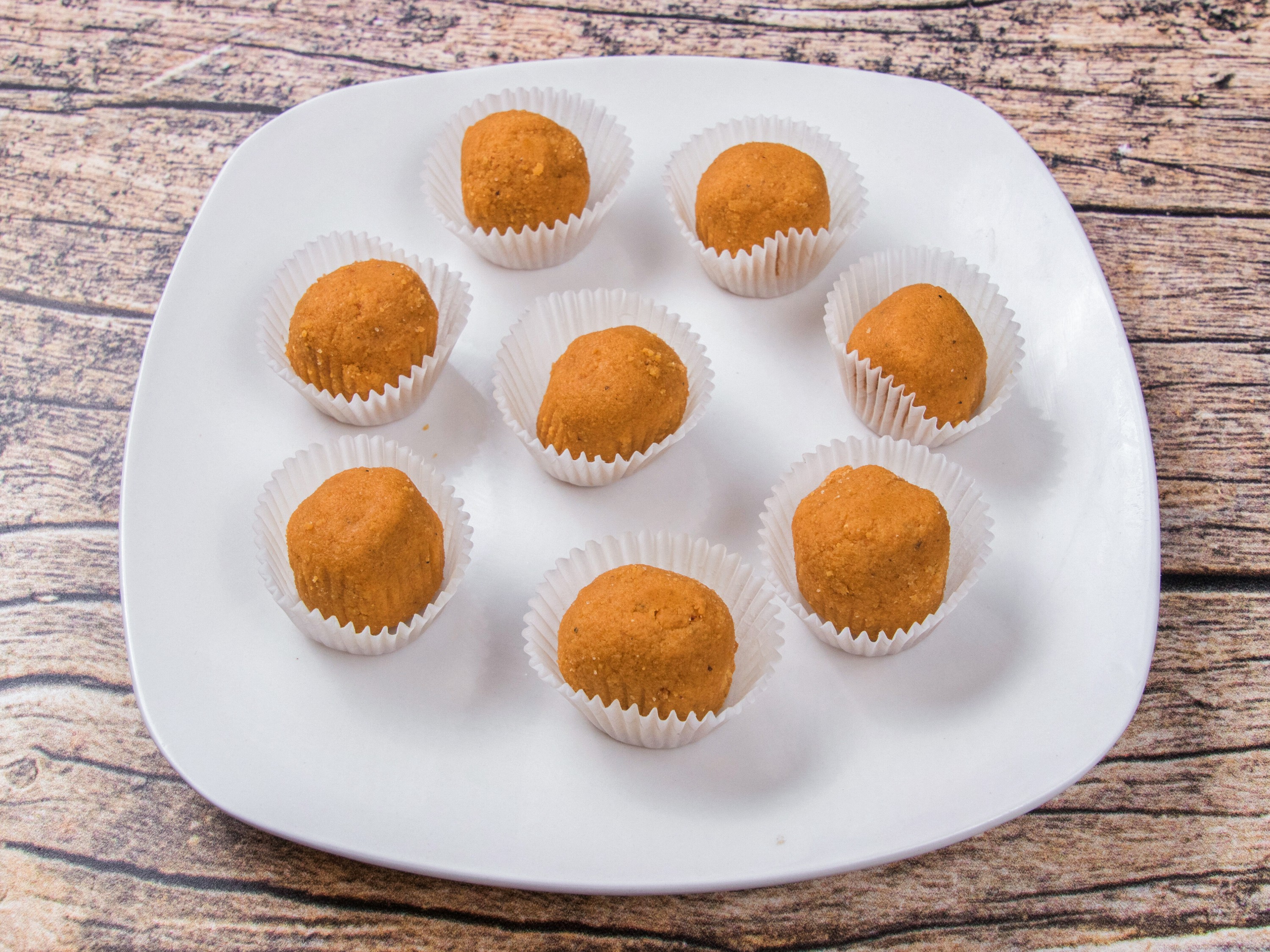 Order Besan Ladoo food online from Royal Sweets store, Decatur on bringmethat.com