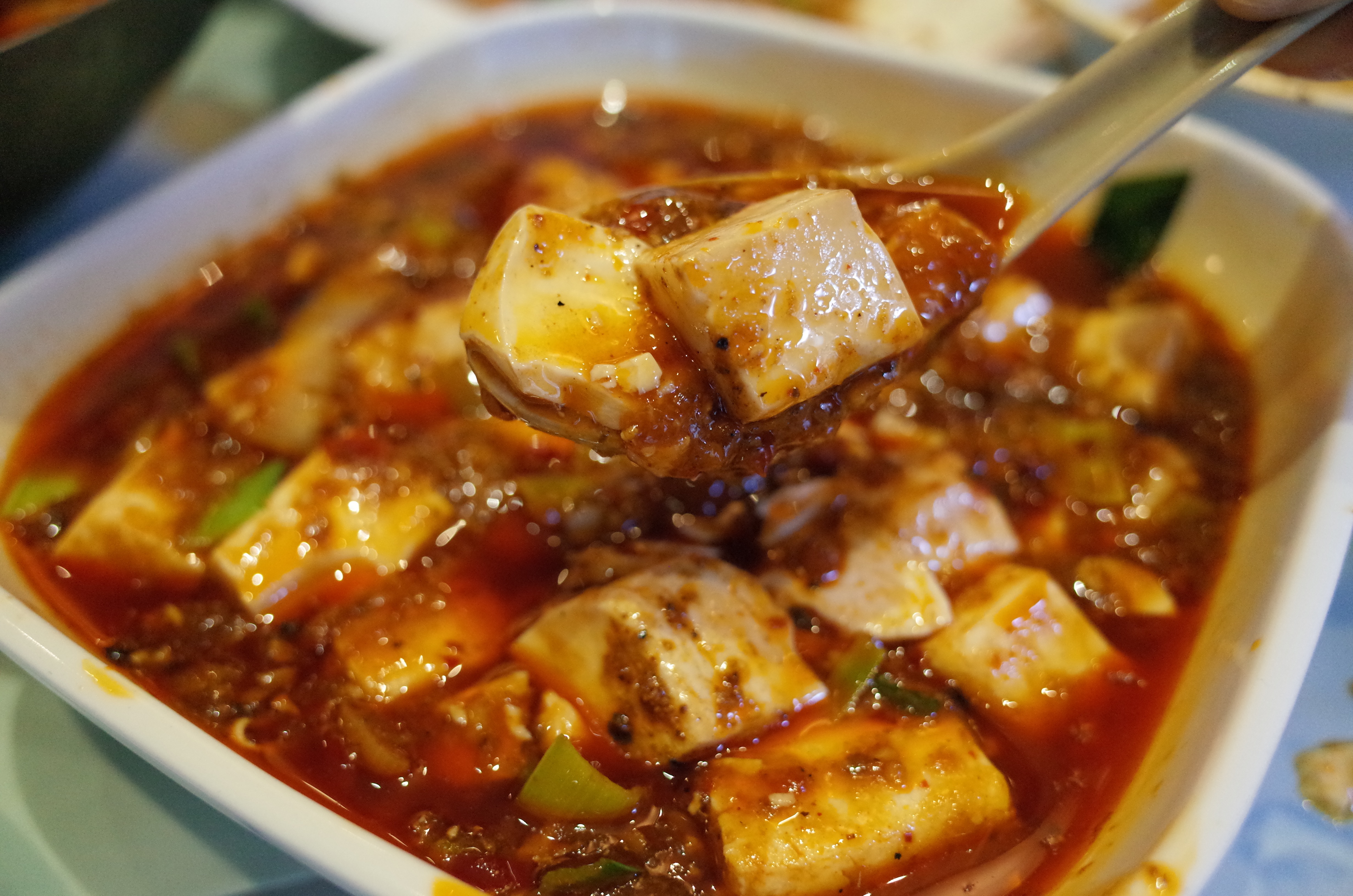 Order 75. Sichuan Spicy Ma Po Tofu with Minced Pork and Black Beans food online from Ollie's Sichuan store, New York on bringmethat.com
