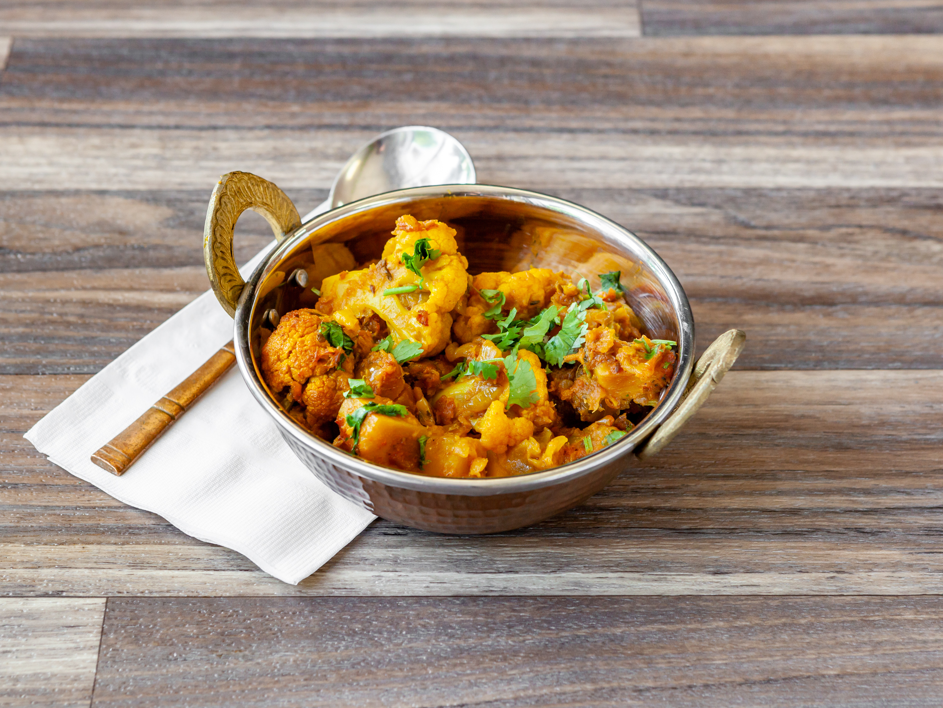 Order Aloo Gobhi food online from East India Grill store, Los Angeles on bringmethat.com