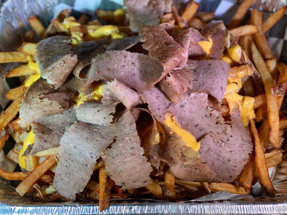 Order PAN OF GG POUTINE FRIES food online from Famous Gyro George store, Maple Heights on bringmethat.com