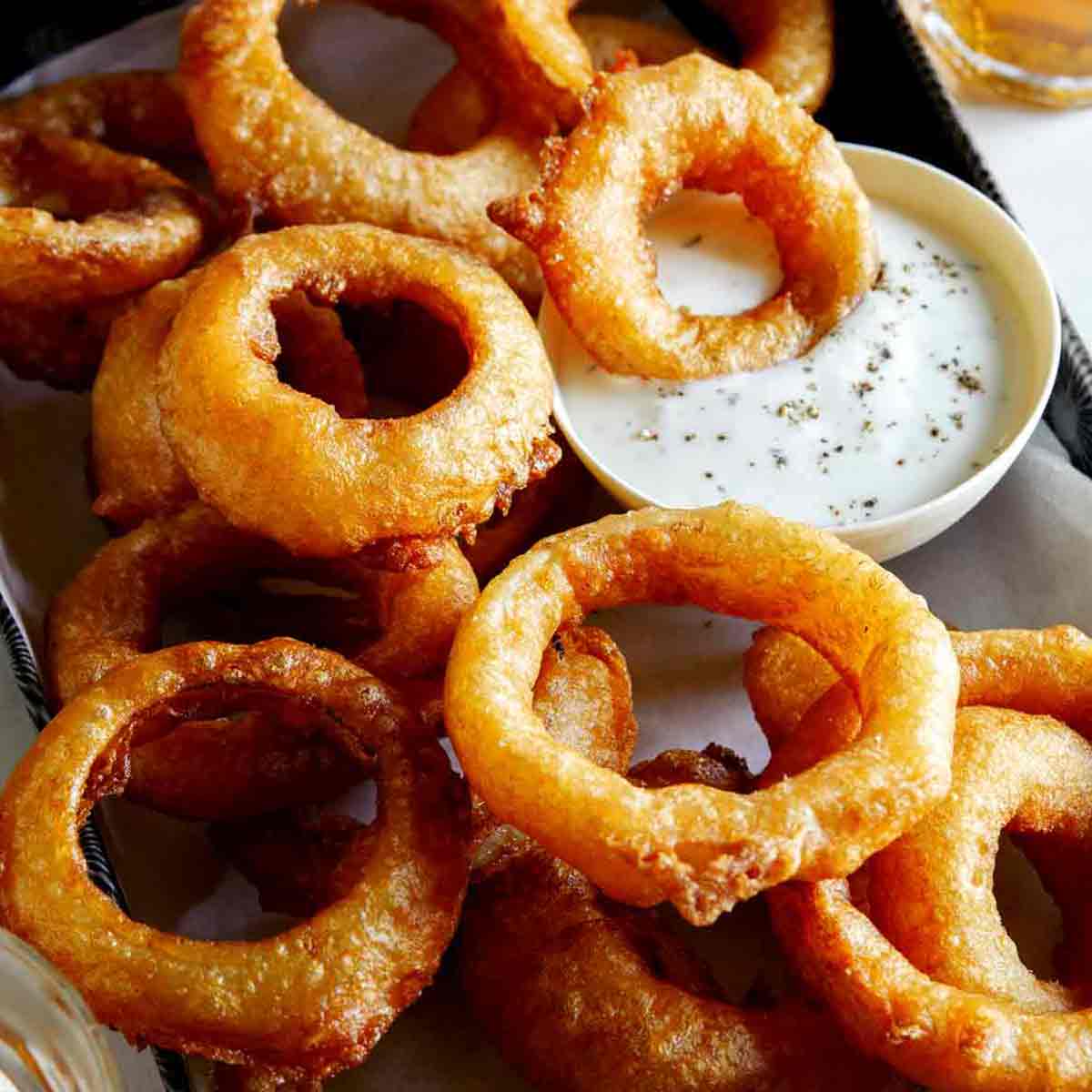 Order Onion rings* food online from Sunset Grill store, Los Angeles on bringmethat.com