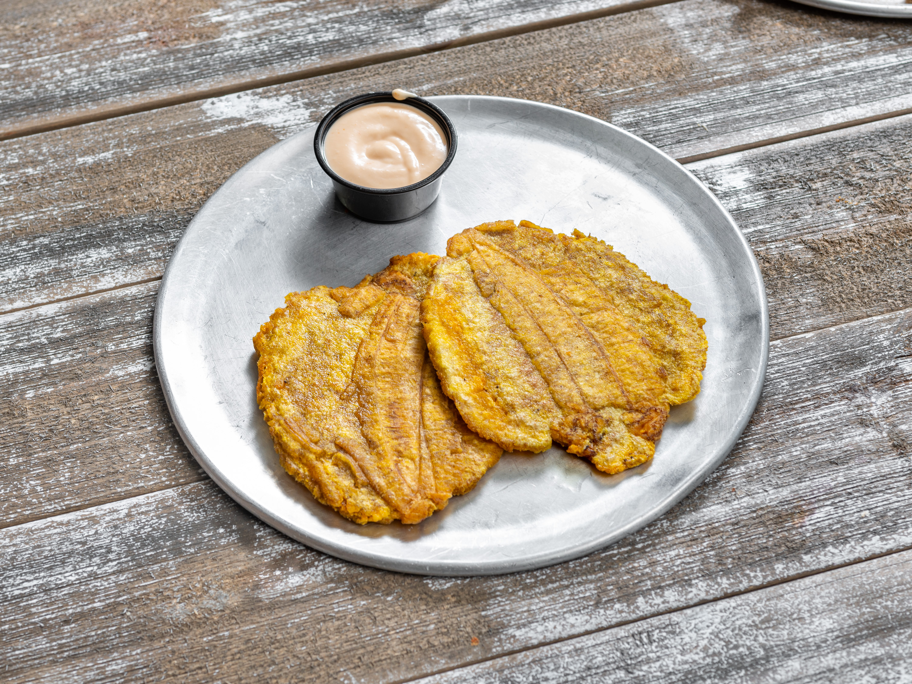 Order 2 Pieces Tostones food online from Pitbullz Pizza store, Lancaster on bringmethat.com