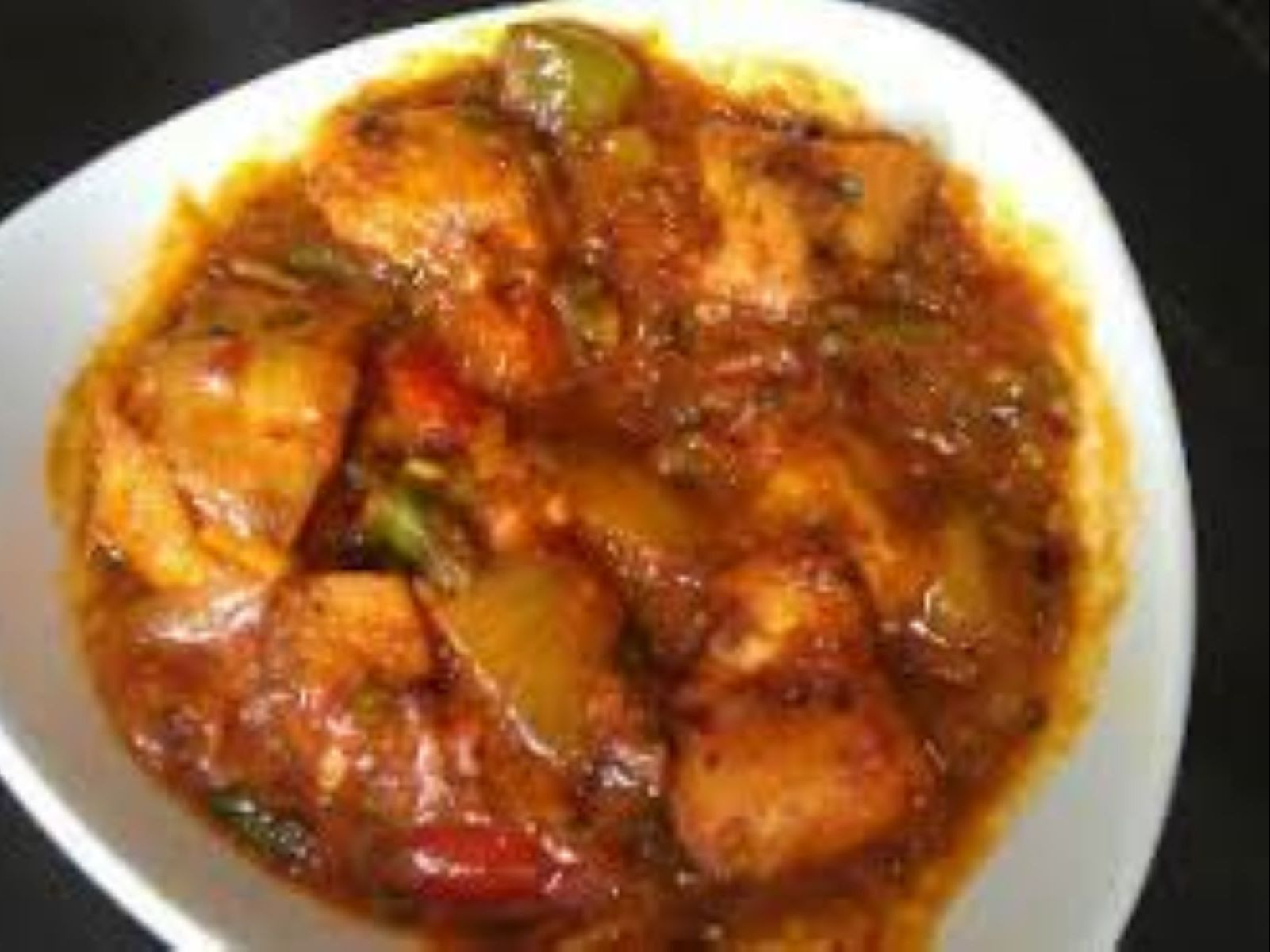 Order Chicken Chili Masala food online from Passage to India store, Cambridge on bringmethat.com