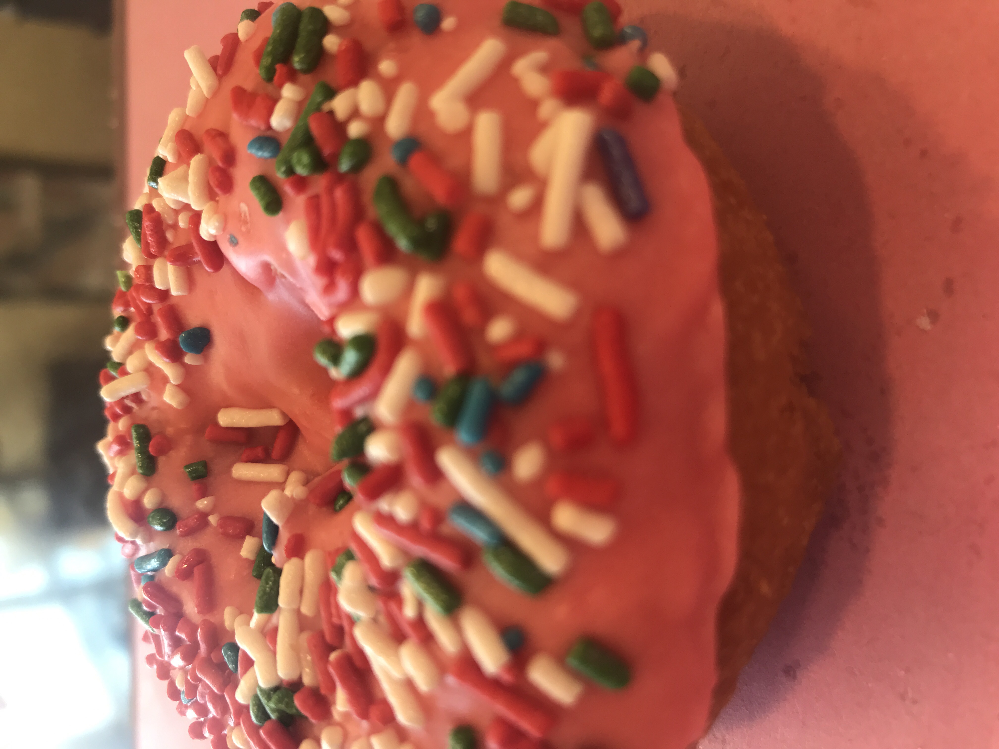 Order White Cake Donut with Pink Icing and Rainbow Sprinkle food online from Angel Panama Lane Donuts store, Bakersfield on bringmethat.com