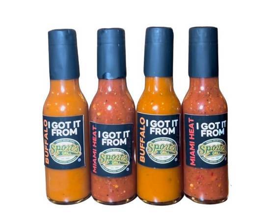 Order Signature Hot Sauce Bottles food online from Sports Grill store, Miami on bringmethat.com