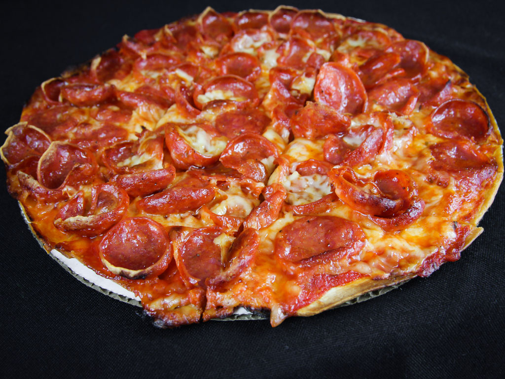 Order Pizza Thin food online from The Thurman Cafe store, Columbus on bringmethat.com