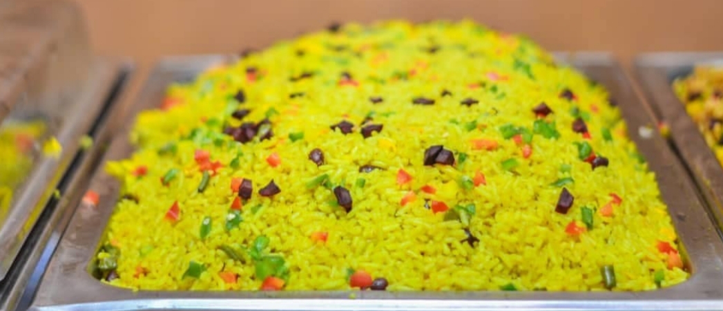 Order Side Rice food online from Intercontinental Nigerian Restaurant store, Columbus on bringmethat.com