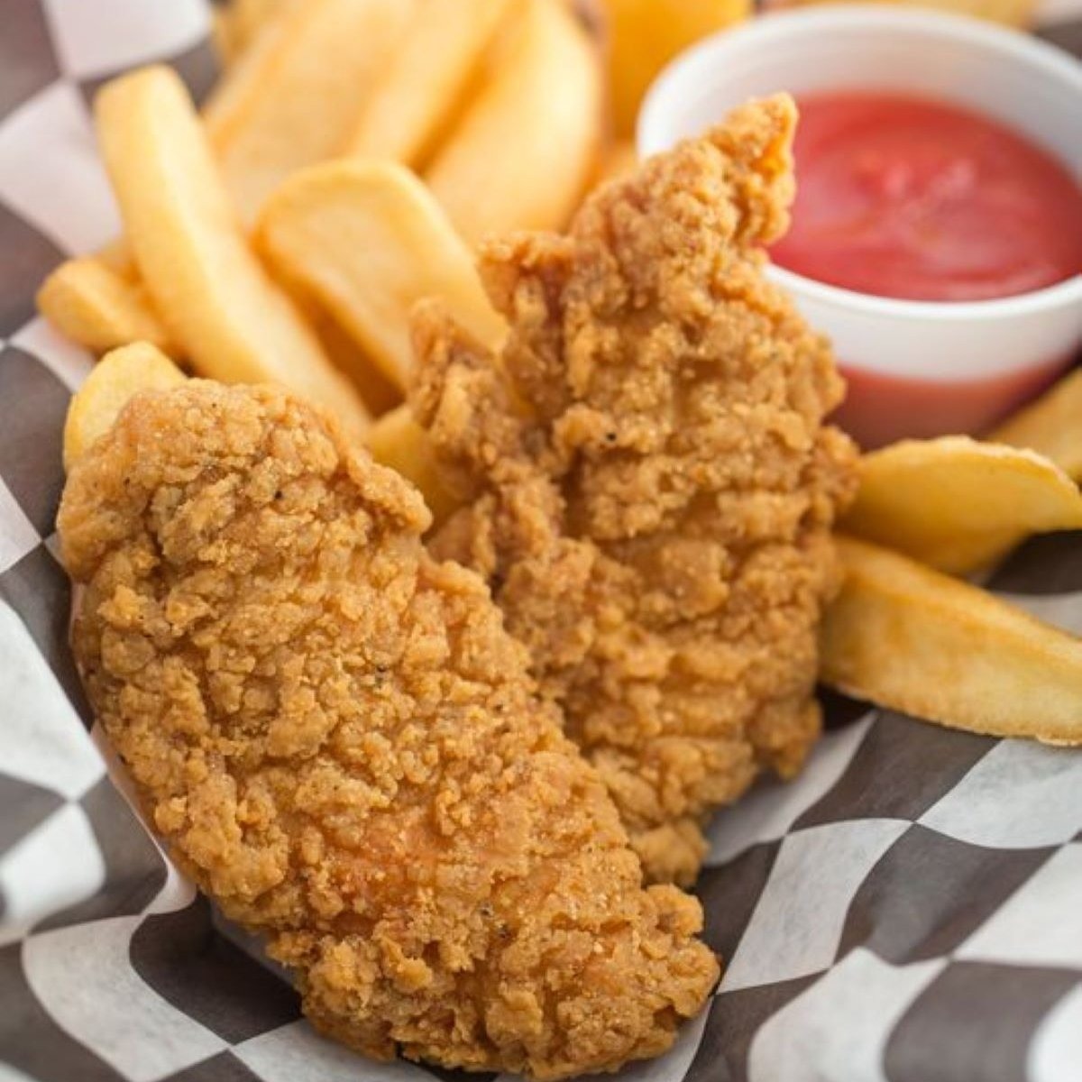 Order Chicken Tenders (2) food online from Huey's Collierville store, Collierville on bringmethat.com