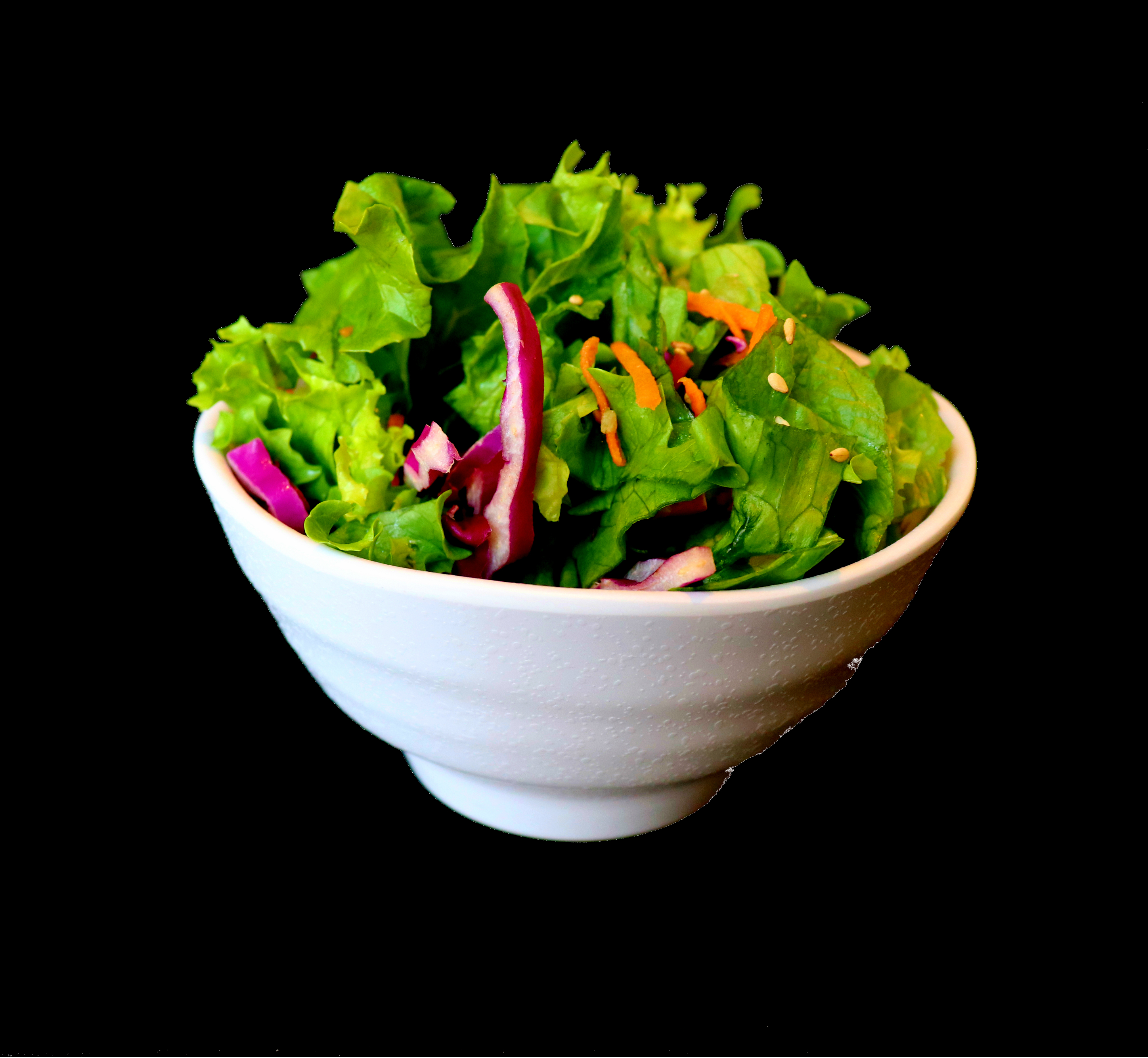 Order Green Salad with sesame dressing food online from Toshiko Ramen And Sushi Bar store, Fresno on bringmethat.com