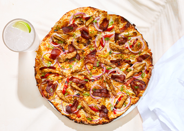 Order Jamaican Jerk Chicken Pizza food online from California Pizza Kitchen - River City Dr store, Jacksonville on bringmethat.com