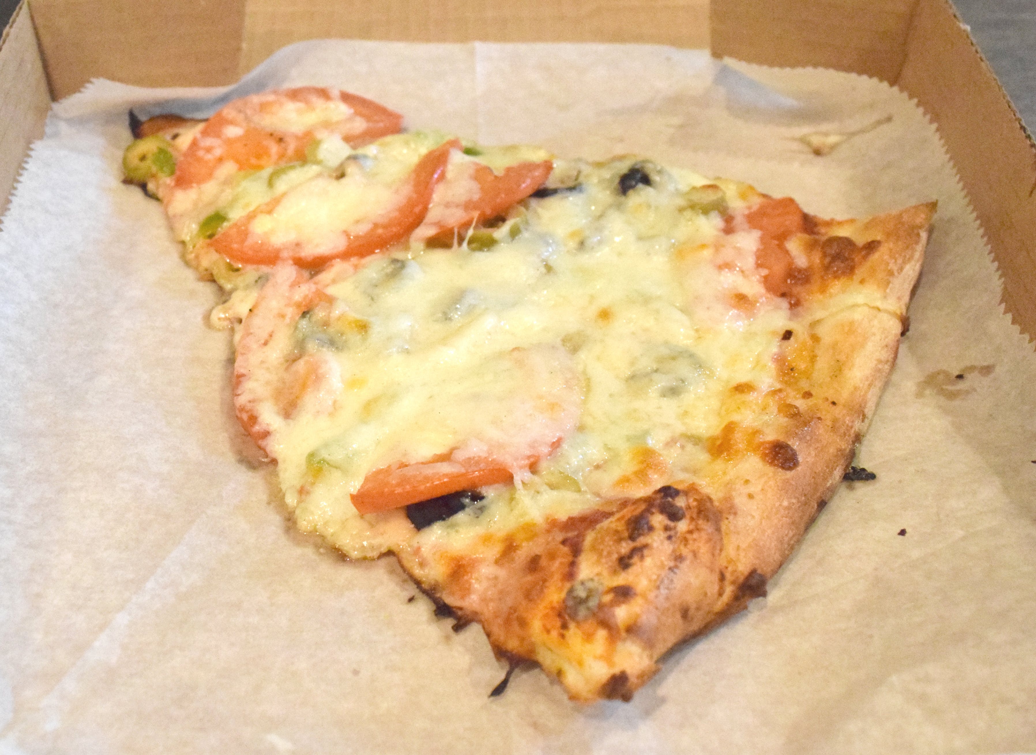Order Vegetarian Pizza Slice - Slice food online from Grant Central Pizza East store, Atlanta on bringmethat.com