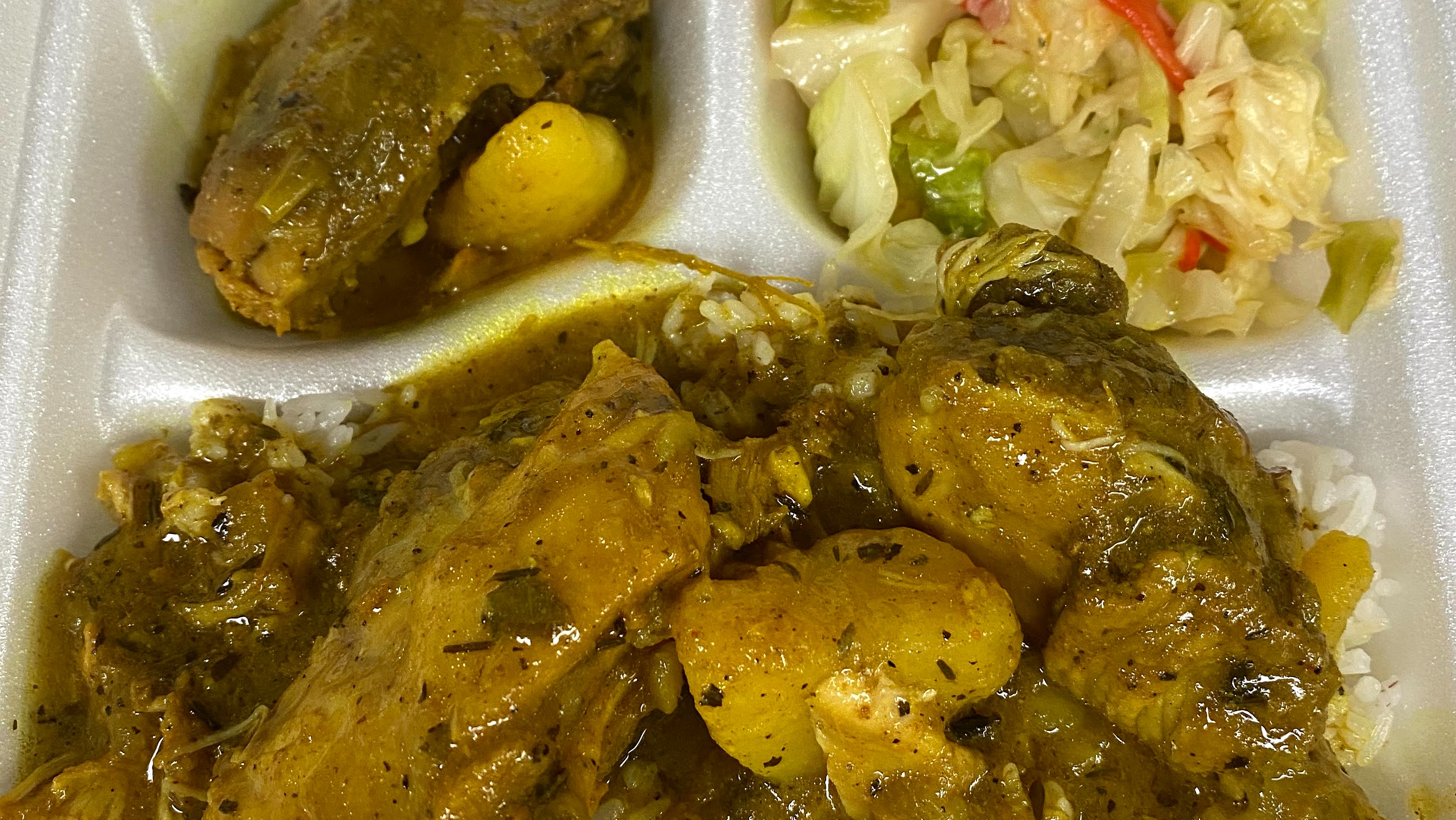 Order Curry Chicken food online from V & J Restaurant Afro-Caribbean And American Food store, Atlanta on bringmethat.com