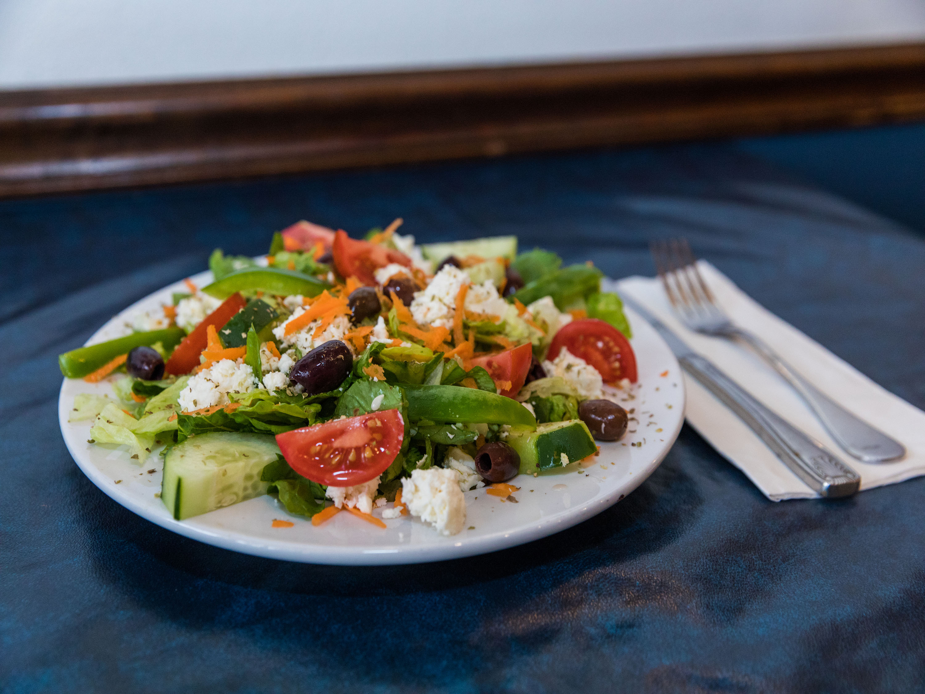 Order Greek Salad food online from Bluffington's Cafe store, Lake Bluff on bringmethat.com