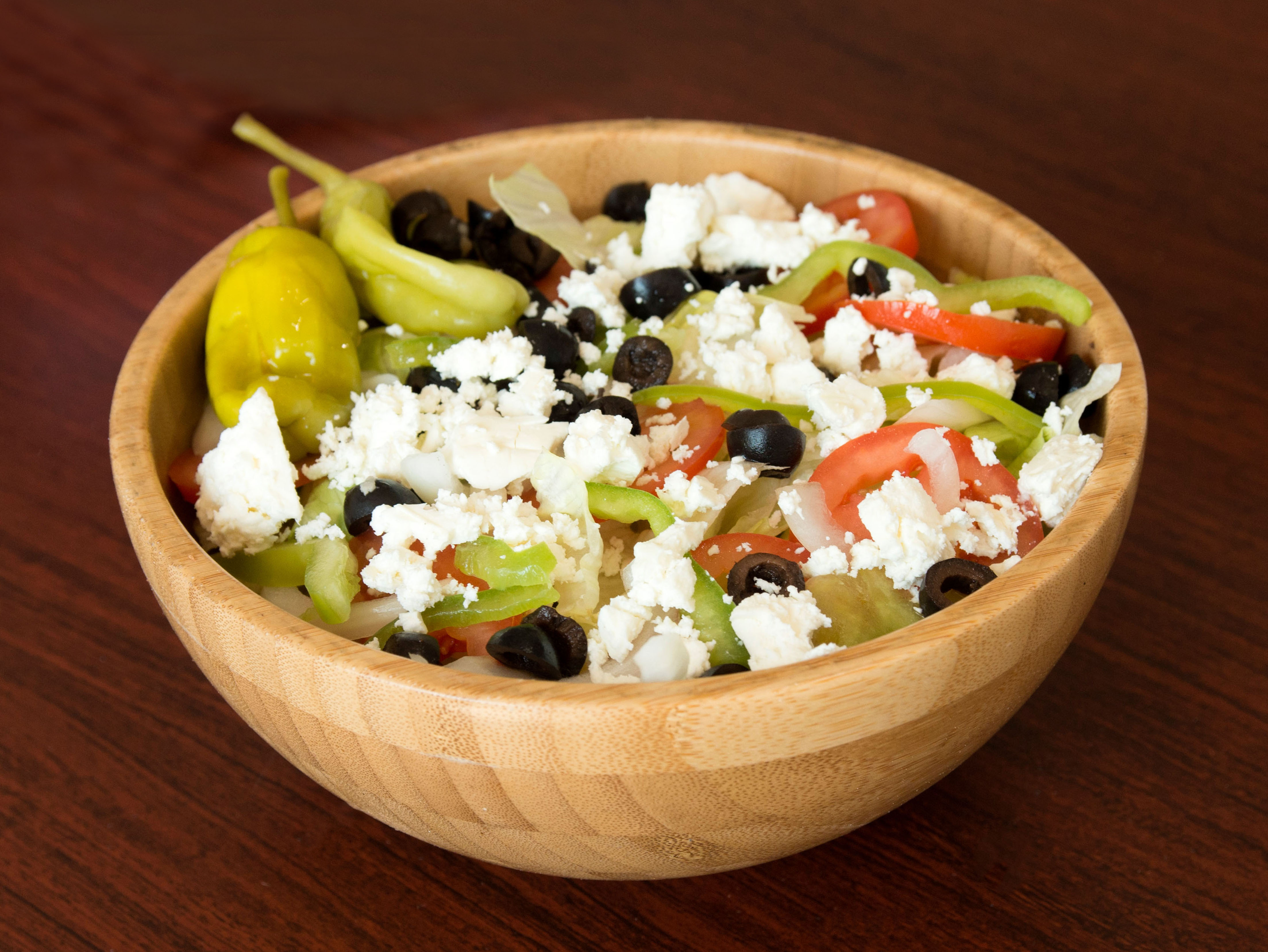 Order Large Greek Salad food online from Pizzero Grill store, Lemon Grove on bringmethat.com