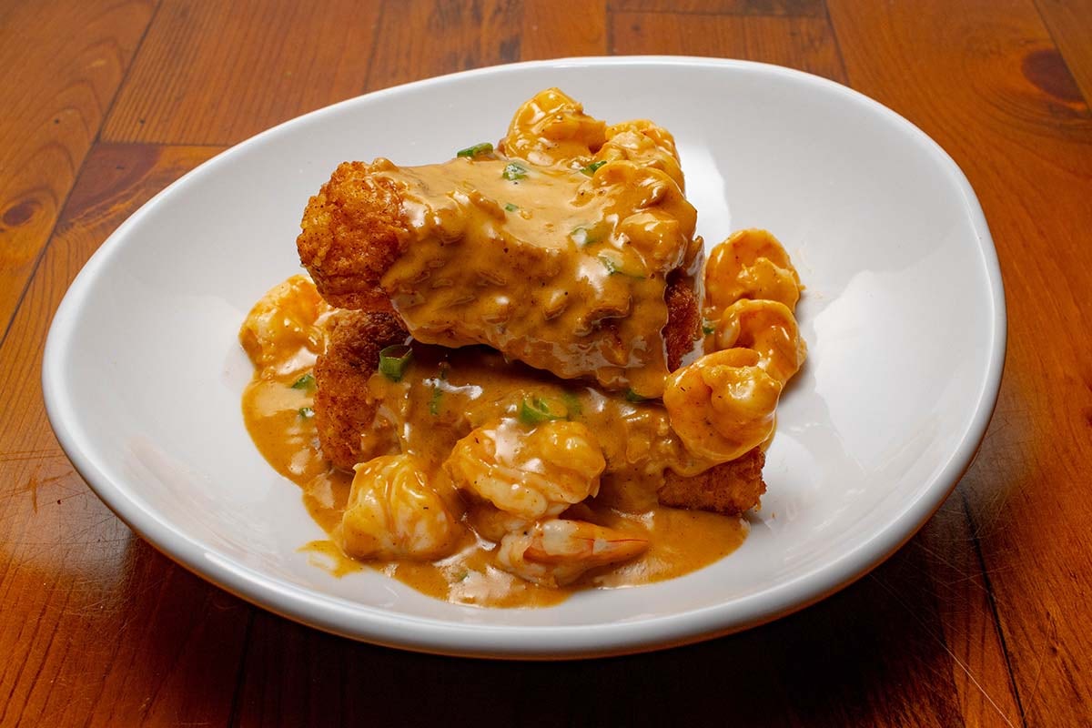 Order Shrimp and Grits food online from Boudreaux Cajun Kitchen store, Houston on bringmethat.com