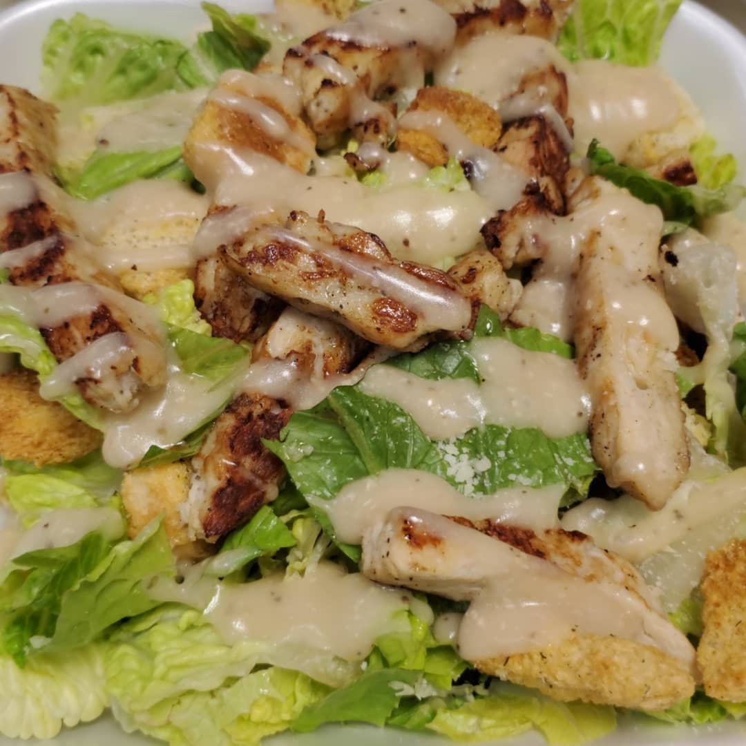 Order Grilled Chicken Caesar Salad - Salad food online from Jo-Jo's Pizza store, Elizabethville on bringmethat.com