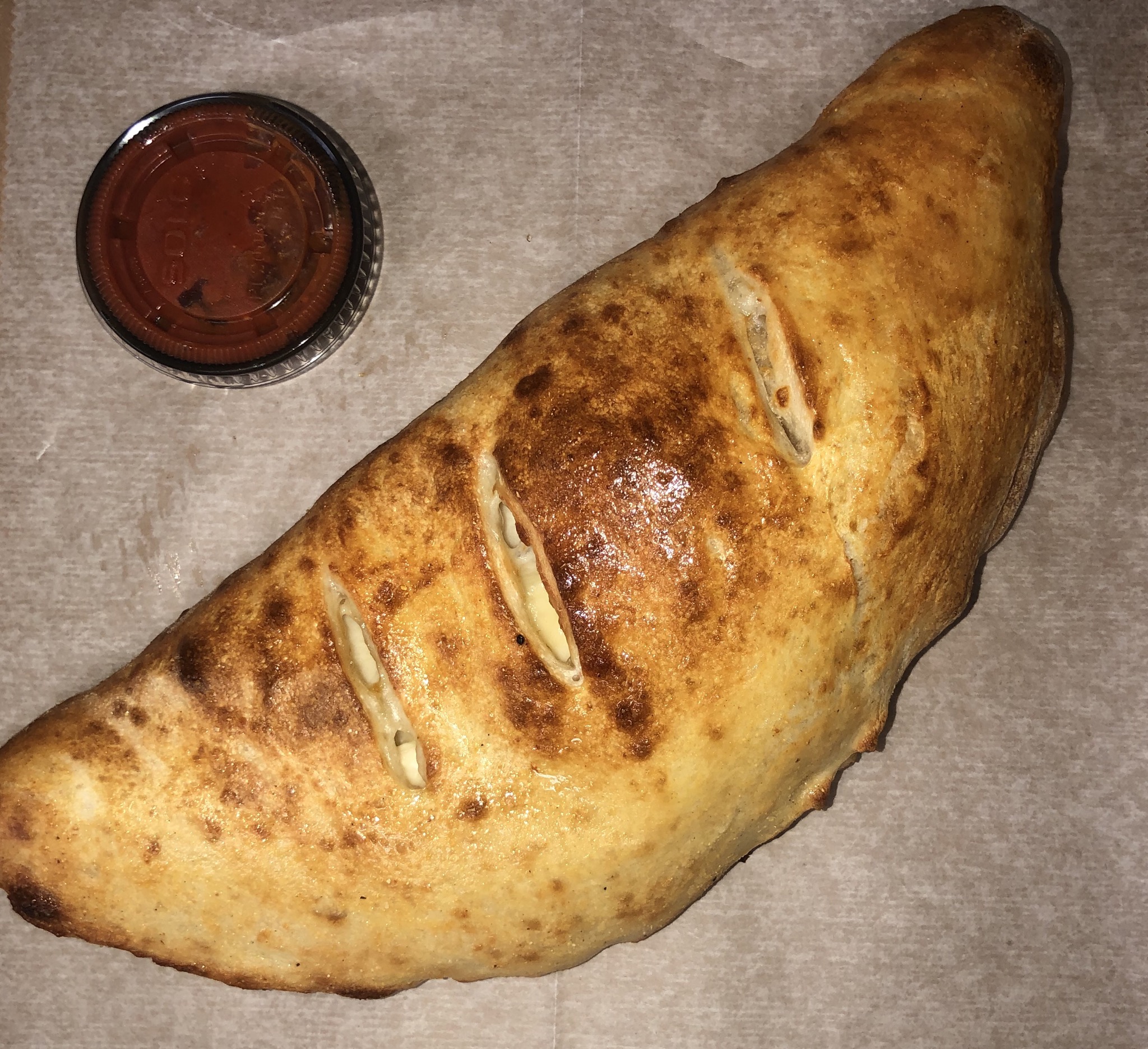 Order Regular Calzone food online from Mikie's pizza store, Baltimore on bringmethat.com