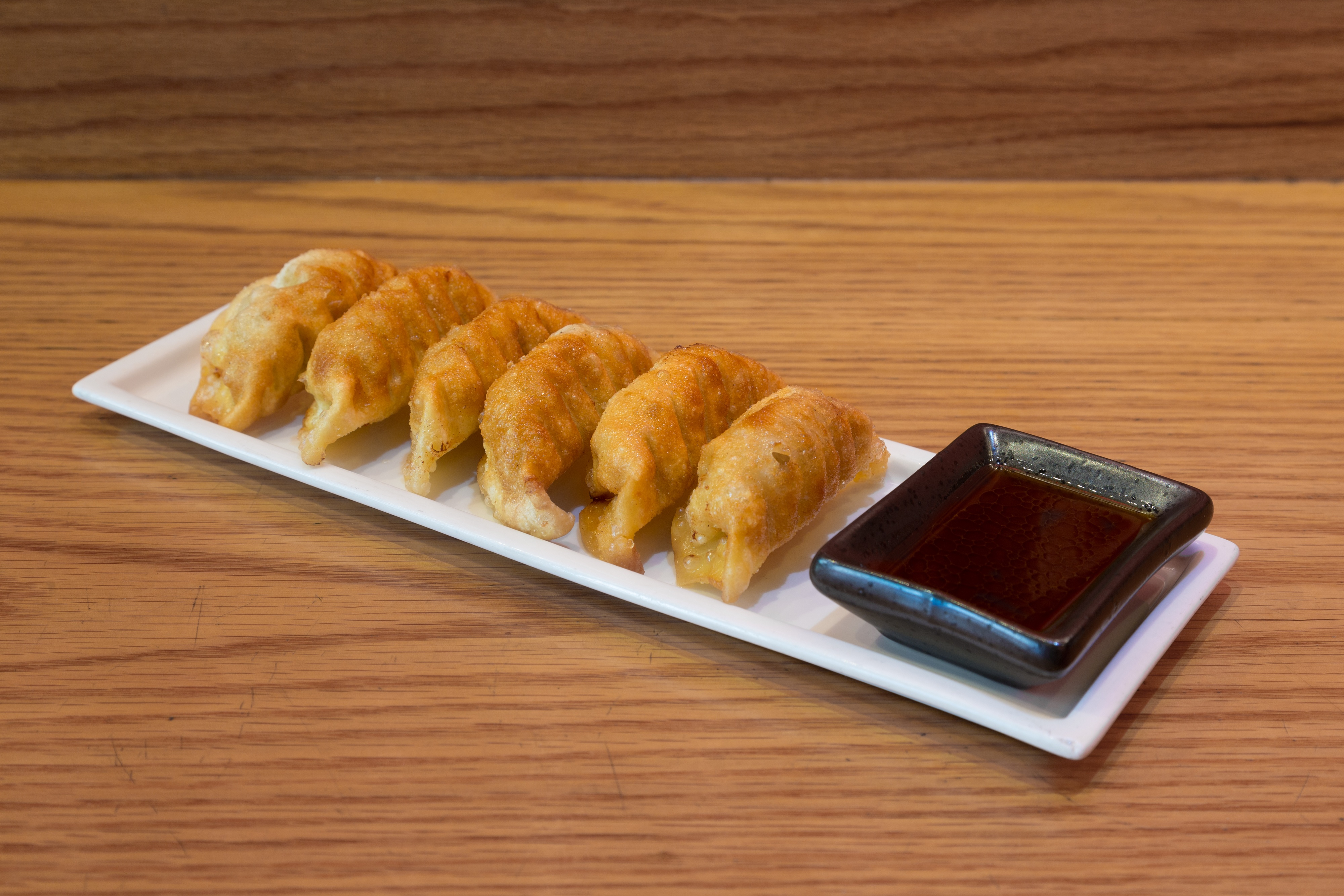 Order Deep Fried Gyoza food online from Totto Ramen Midtown East store, New York on bringmethat.com