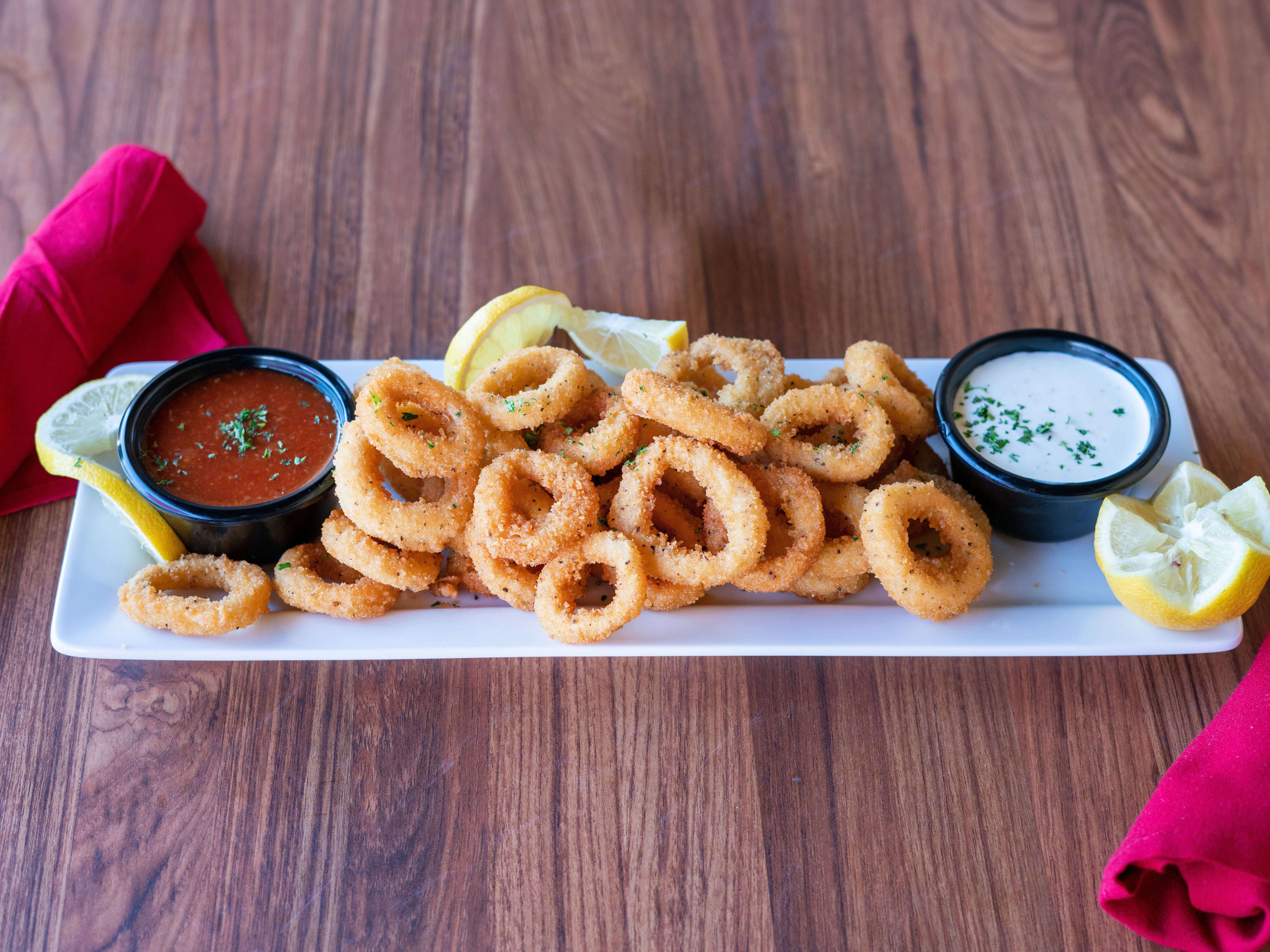 Order Fried Calamari food online from Vito Pizza & Grill store, Irving on bringmethat.com