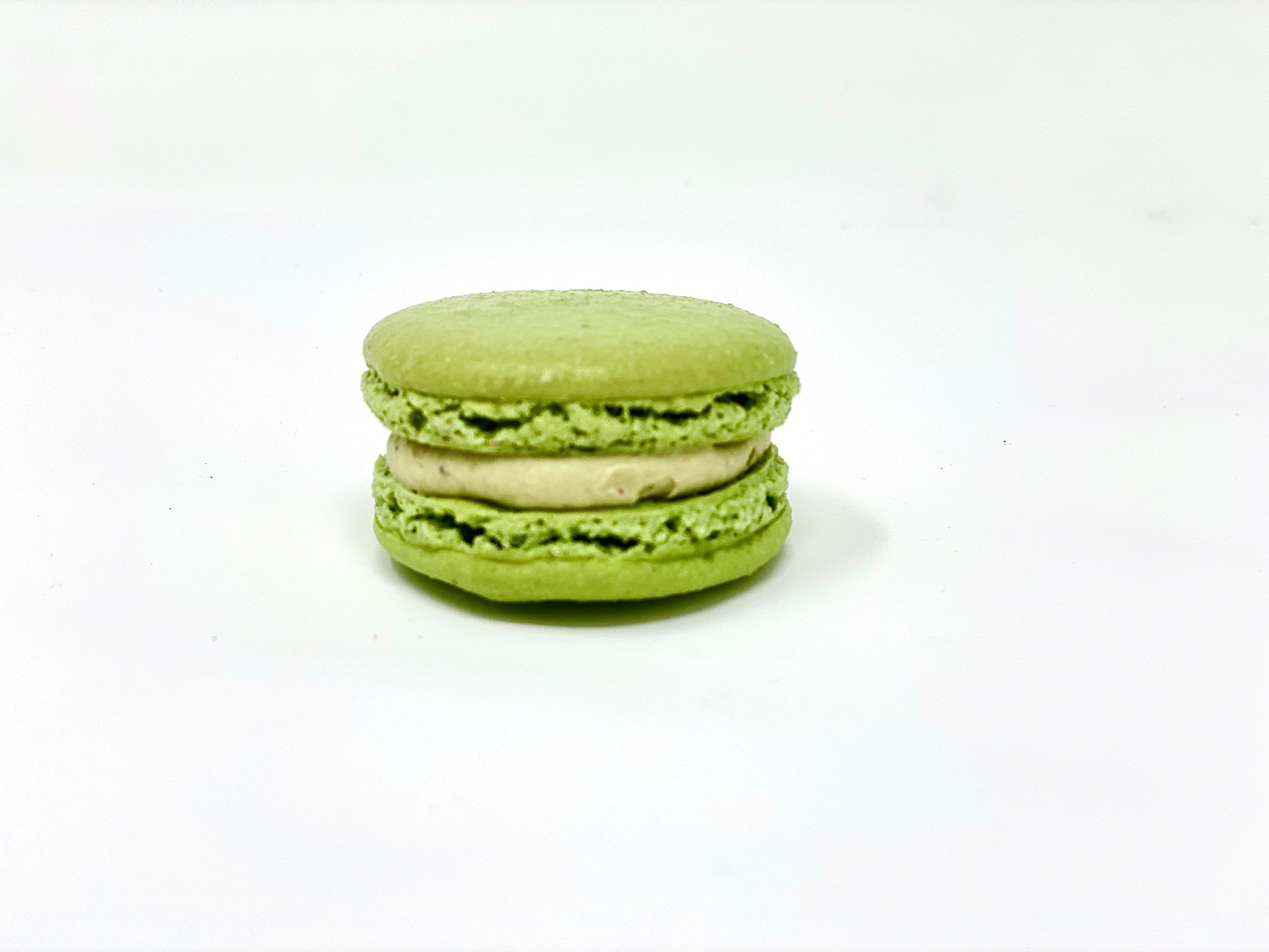 Order Pistachio Macaron food online from Joy And Sweets store, Culver City on bringmethat.com