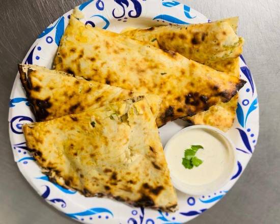 Order Cheese Naan food online from Flavours Of India store, Gresham on bringmethat.com