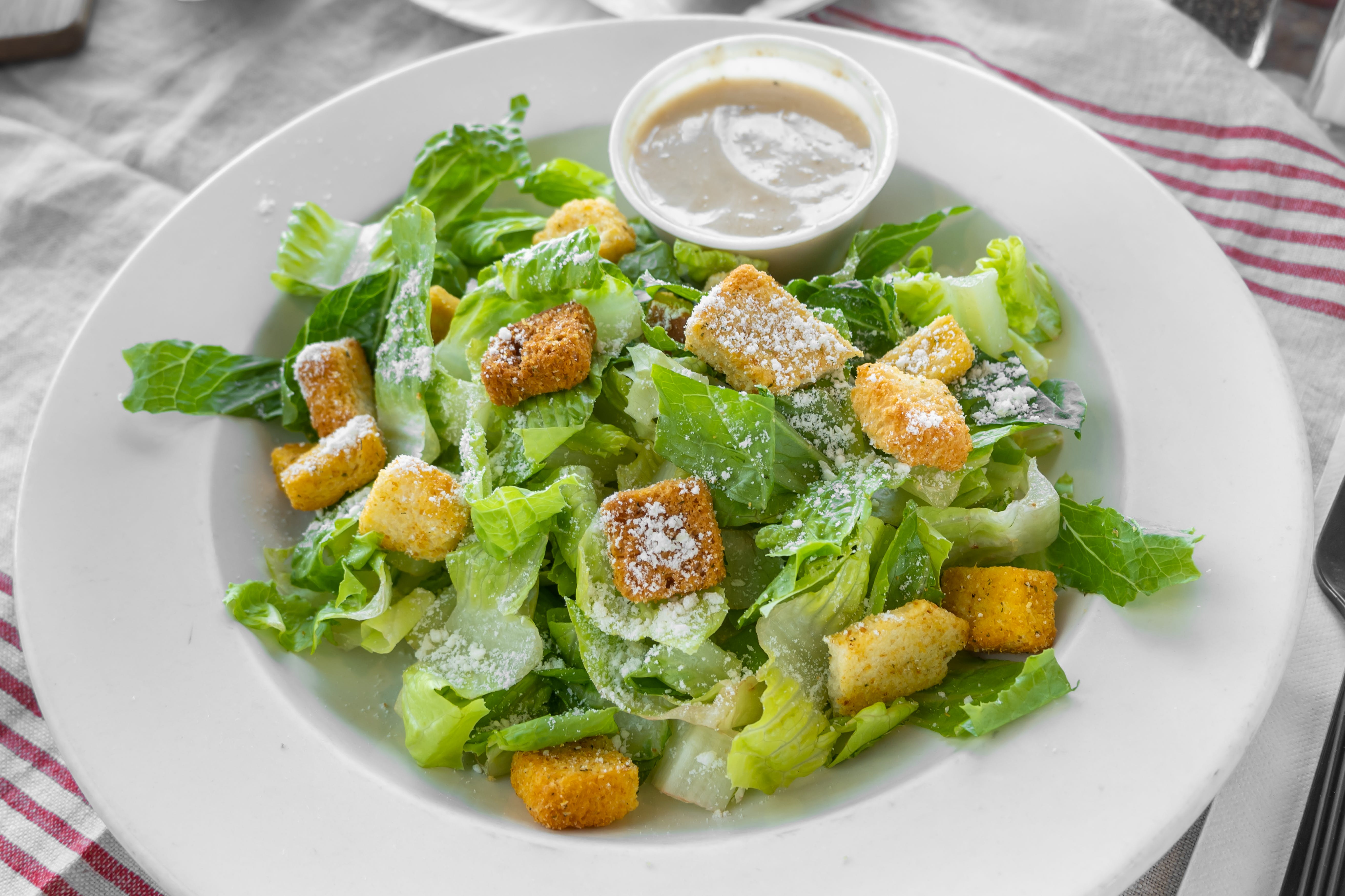 Order Caesar Salad - Small food online from Divincenzo Pizza store, Cinnaminson on bringmethat.com