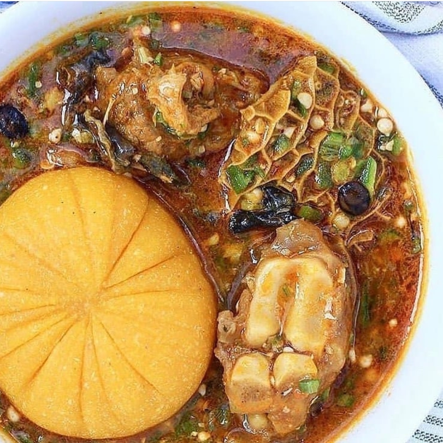 Order Okra Soup with Garri Fufu food online from Intercontinental Nigerian Restaurant store, Columbus on bringmethat.com
