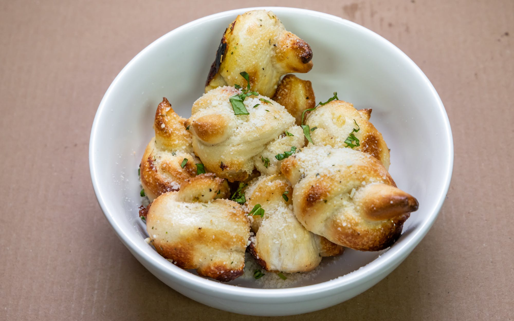 Order Garlic Knots food online from West Avenue Pizzeria store, Saratoga Springs on bringmethat.com