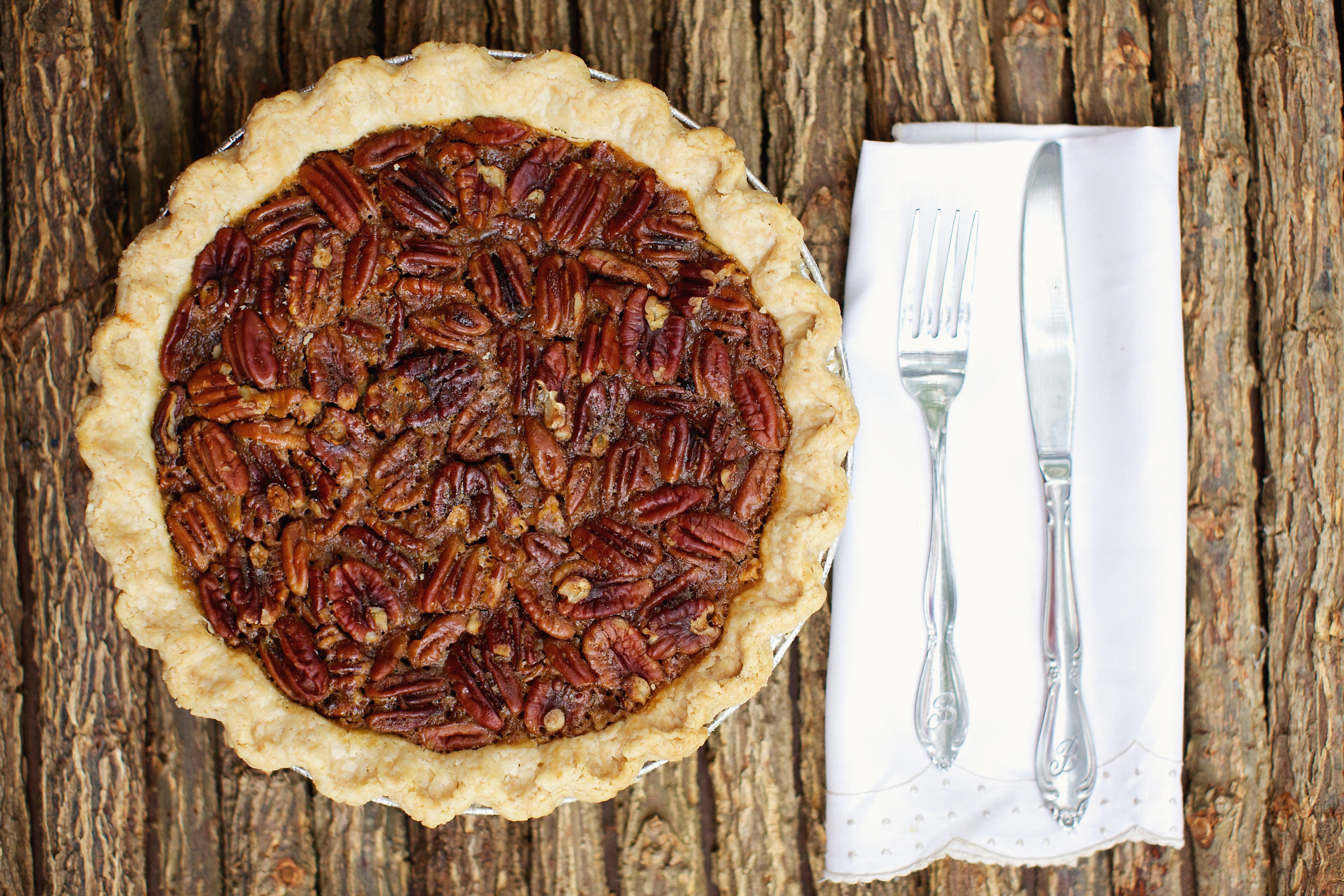Order 10" Caramel Pecan Pie food online from Southern Baked Pie Company store, Atlanta on bringmethat.com