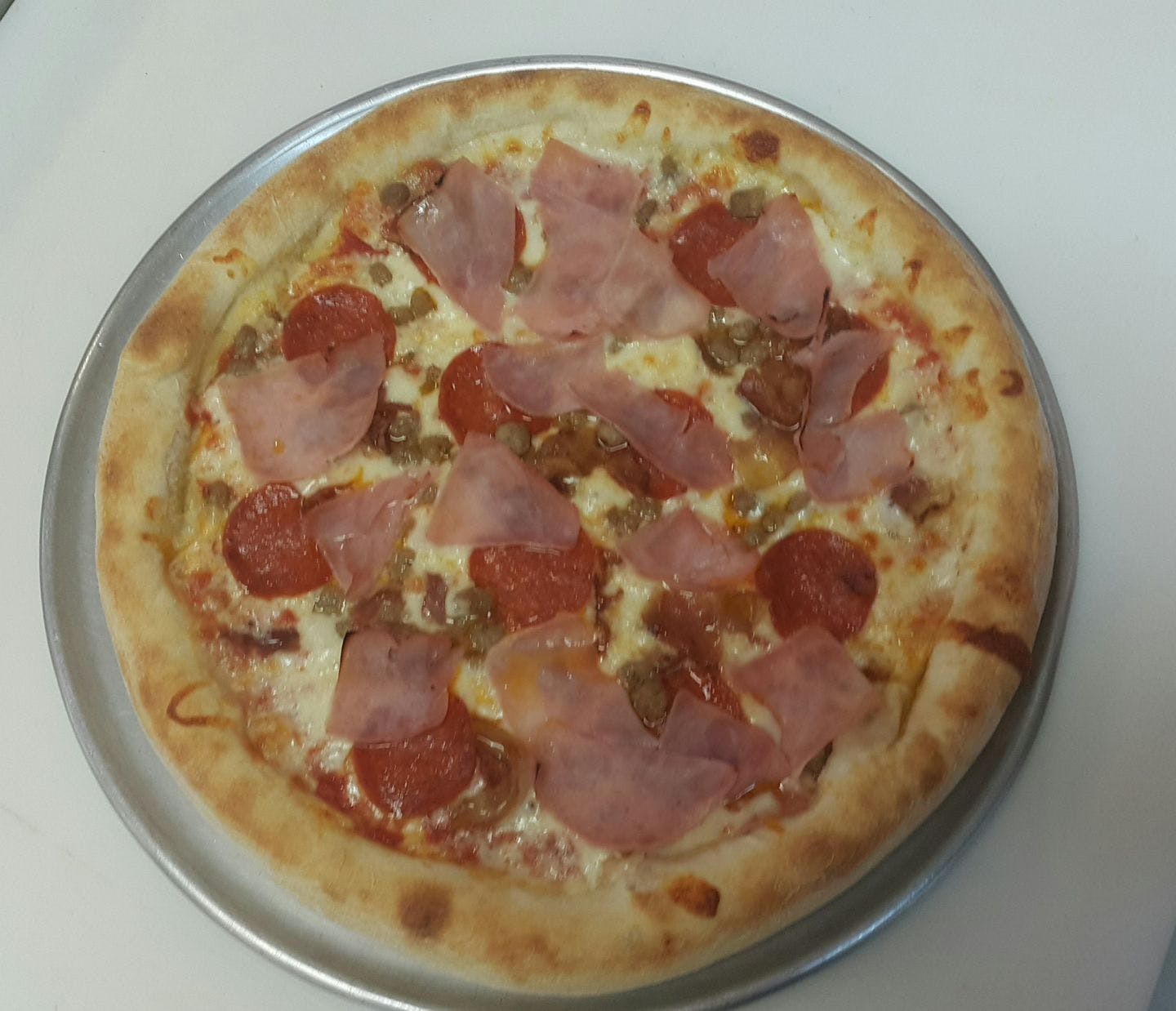 Order Meat Lovers Pizza - 12" food online from Roberto Pizza store, Harrisburg on bringmethat.com
