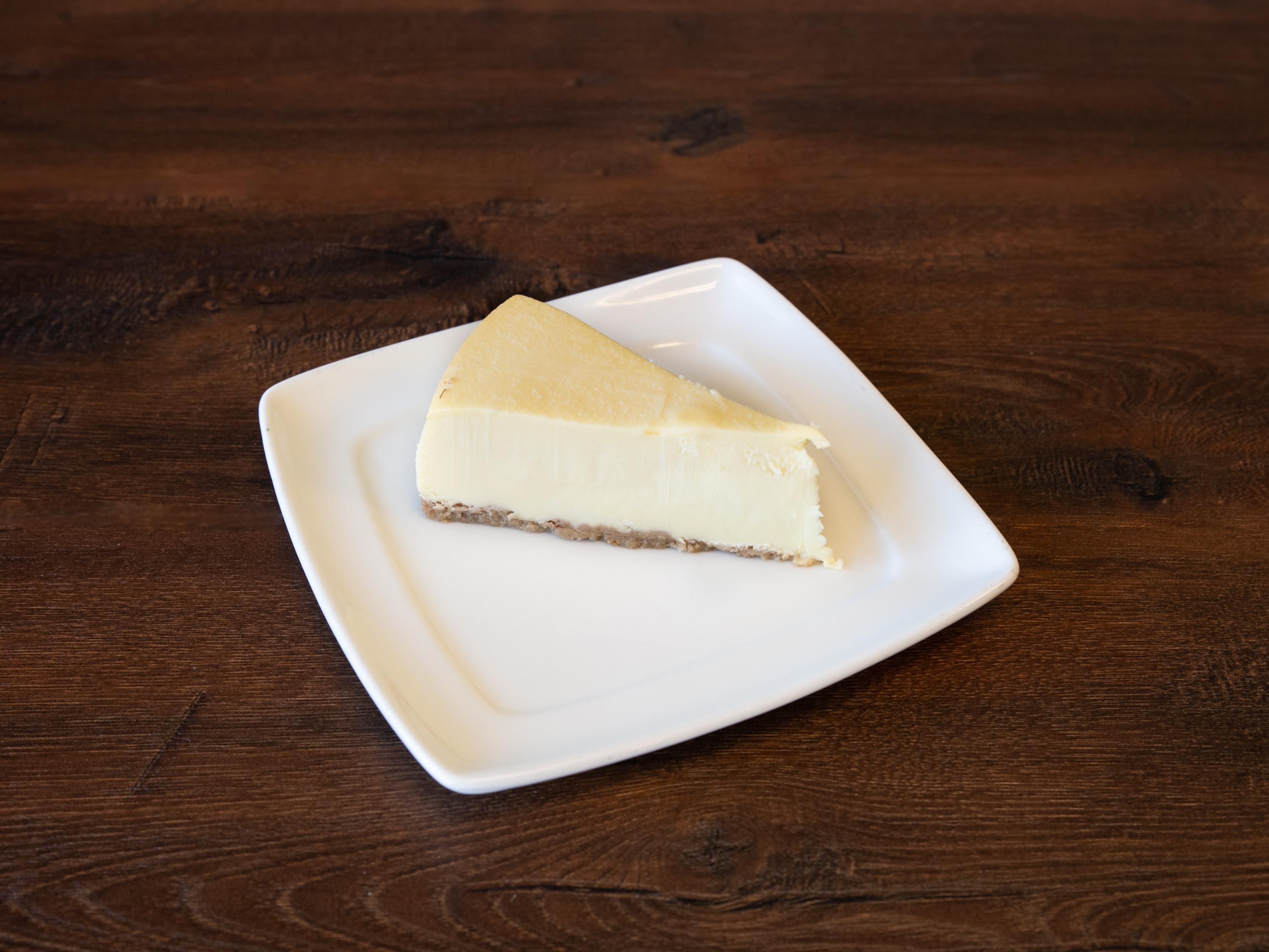 Order New York Style Cheesecake food online from Italian Village Pizza store, Orlando on bringmethat.com