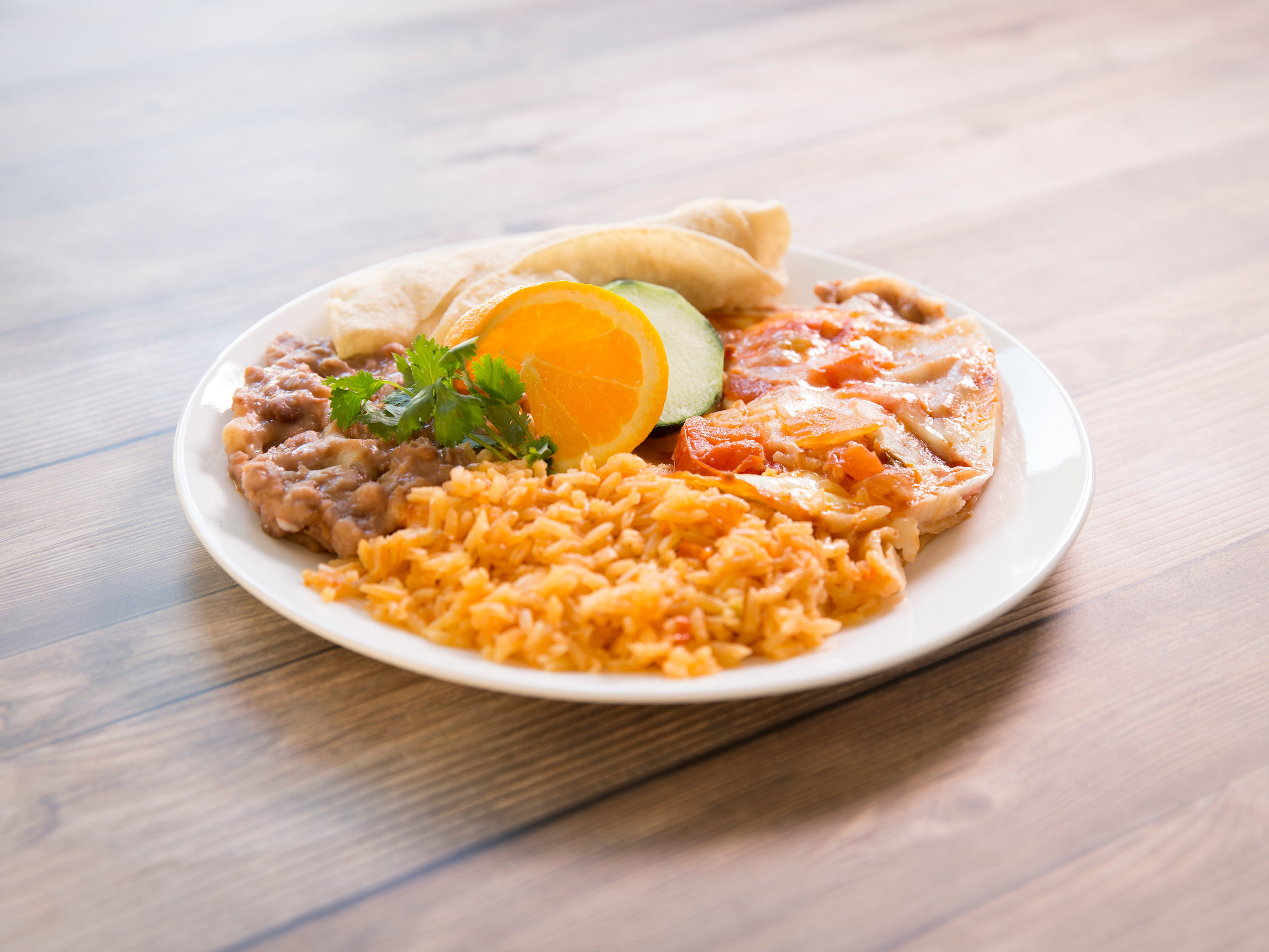 Order Huevos Rancheros food online from Mariscos Vallarta store, Van Nuys on bringmethat.com