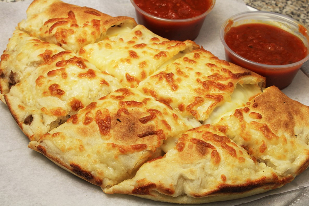 Order Steak and Cheese Calzone food online from Nicholas Pizza store, Needham on bringmethat.com