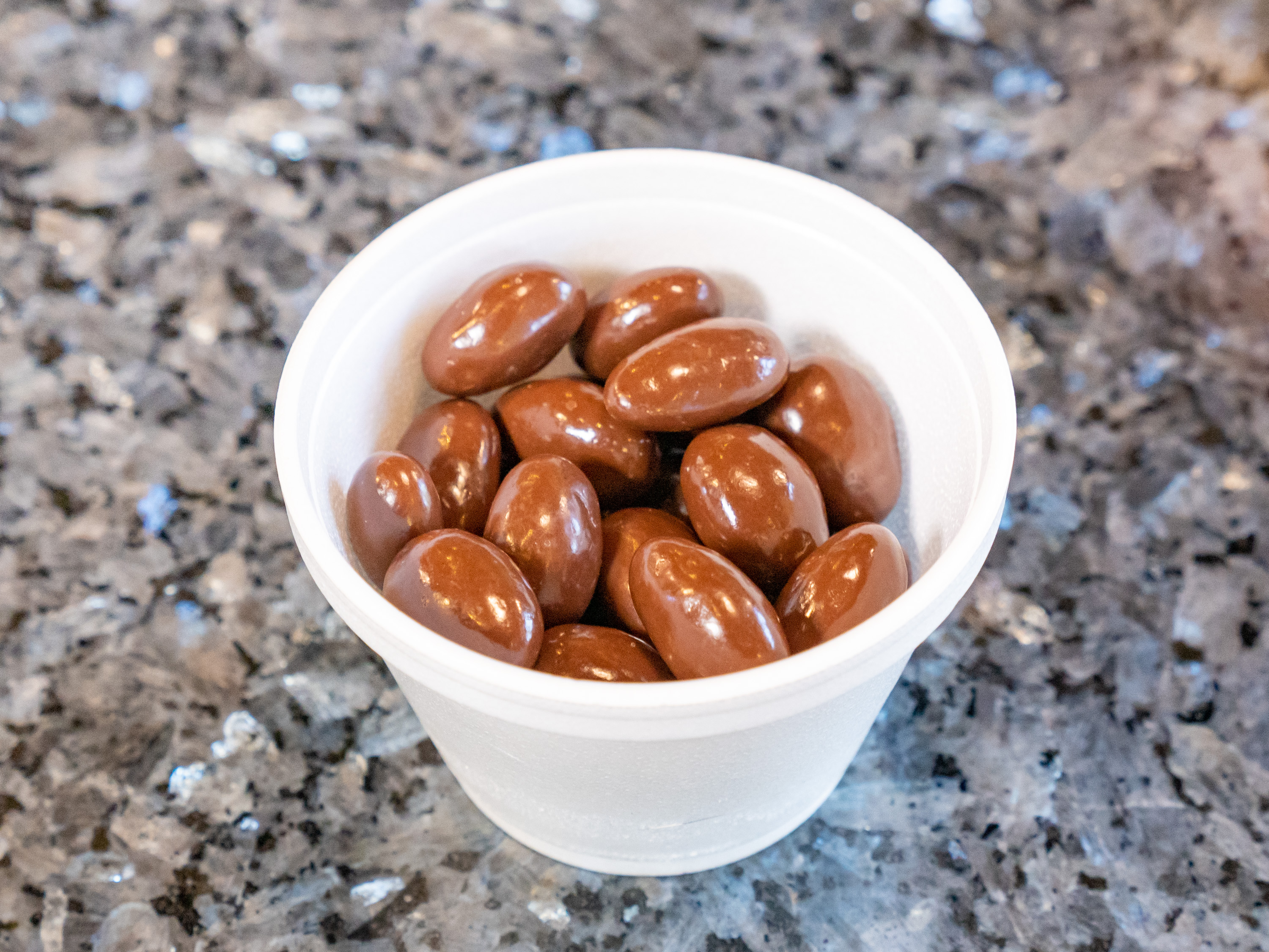 Order 1/4 lb. Milk Chocolate Almonds food online from Sawyer Sweet Spot store, Yuba City on bringmethat.com