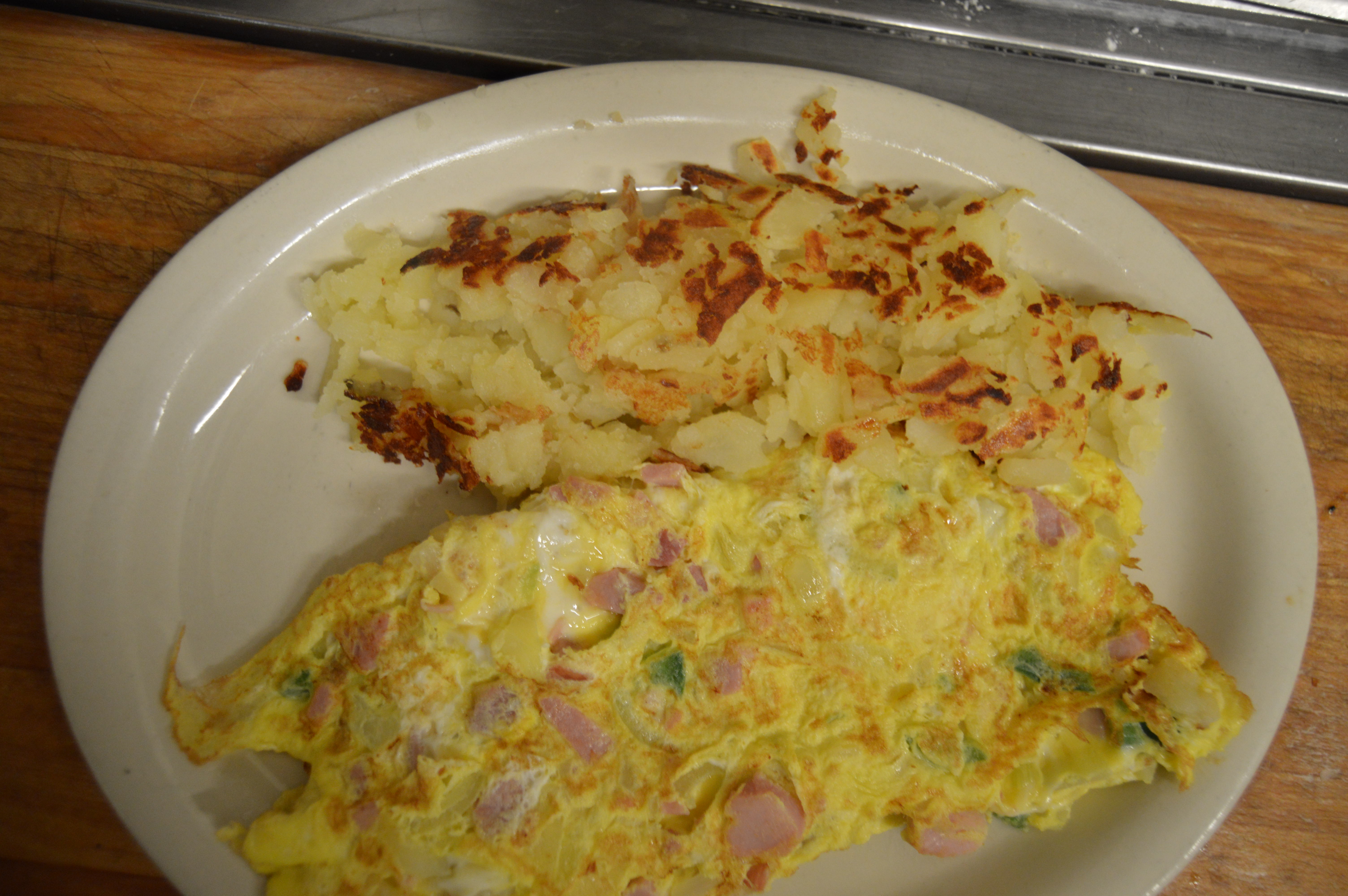 Order Deluxe Western Omelette food online from Angelas family restaurant store, Cleveland on bringmethat.com