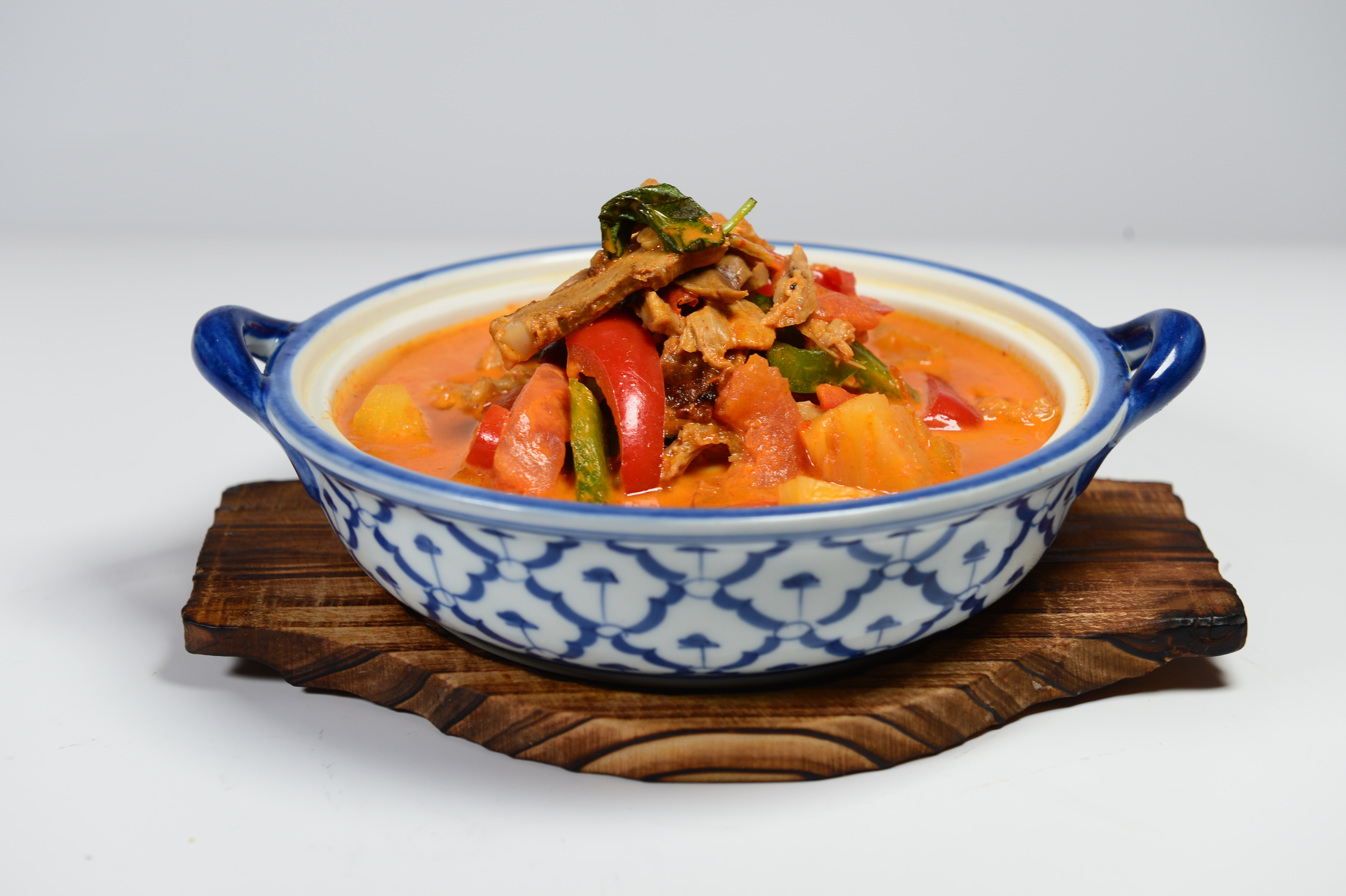Order Red Curry Duck food online from Lemongrass Thai Cuisine store, San Francisco on bringmethat.com