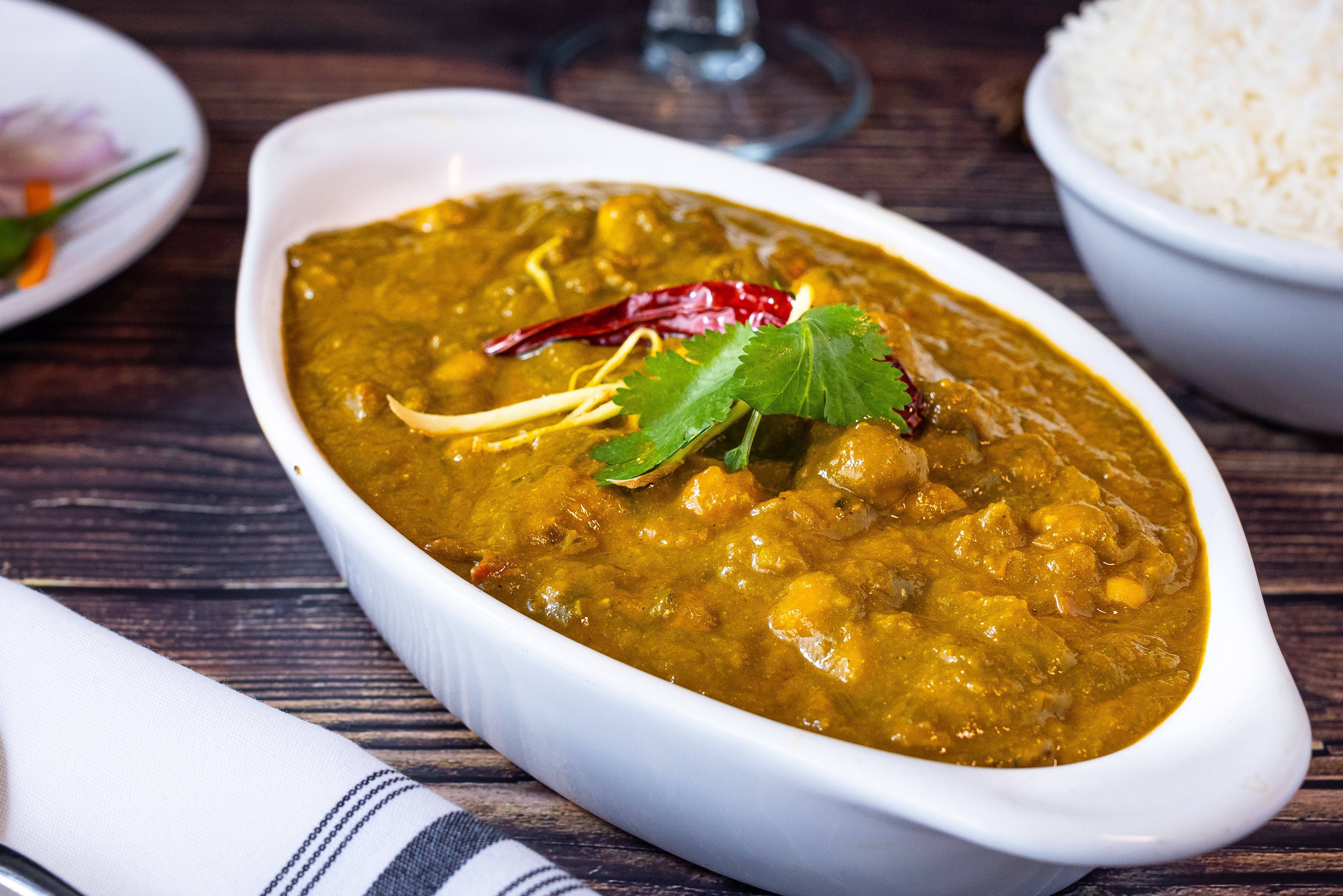 Order Chana Saag food online from Amaravati Indian Cuisine store, Brentwood on bringmethat.com