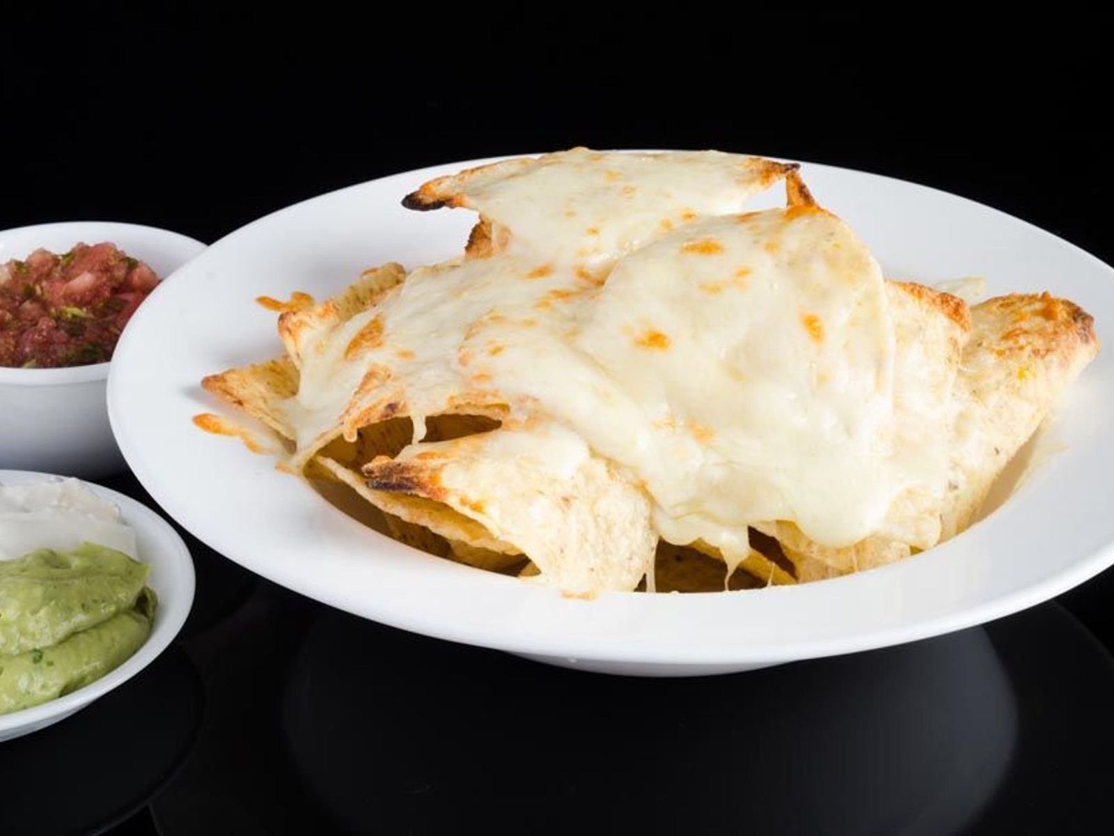 Order Mexican Nachos food online from cafe muscat store, Fresh Meadows on bringmethat.com