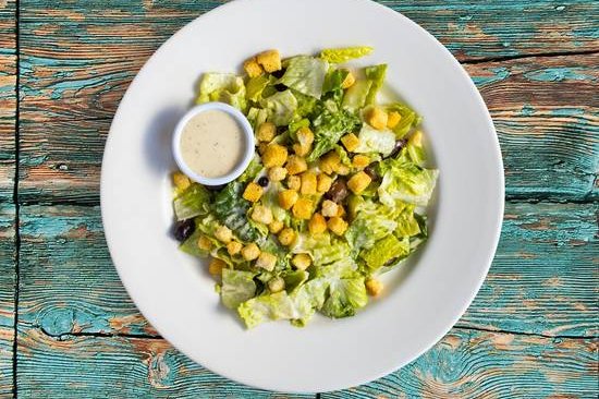 Order Roman Romaine Salad food online from Gogo Chicken Wings store, San Diego on bringmethat.com