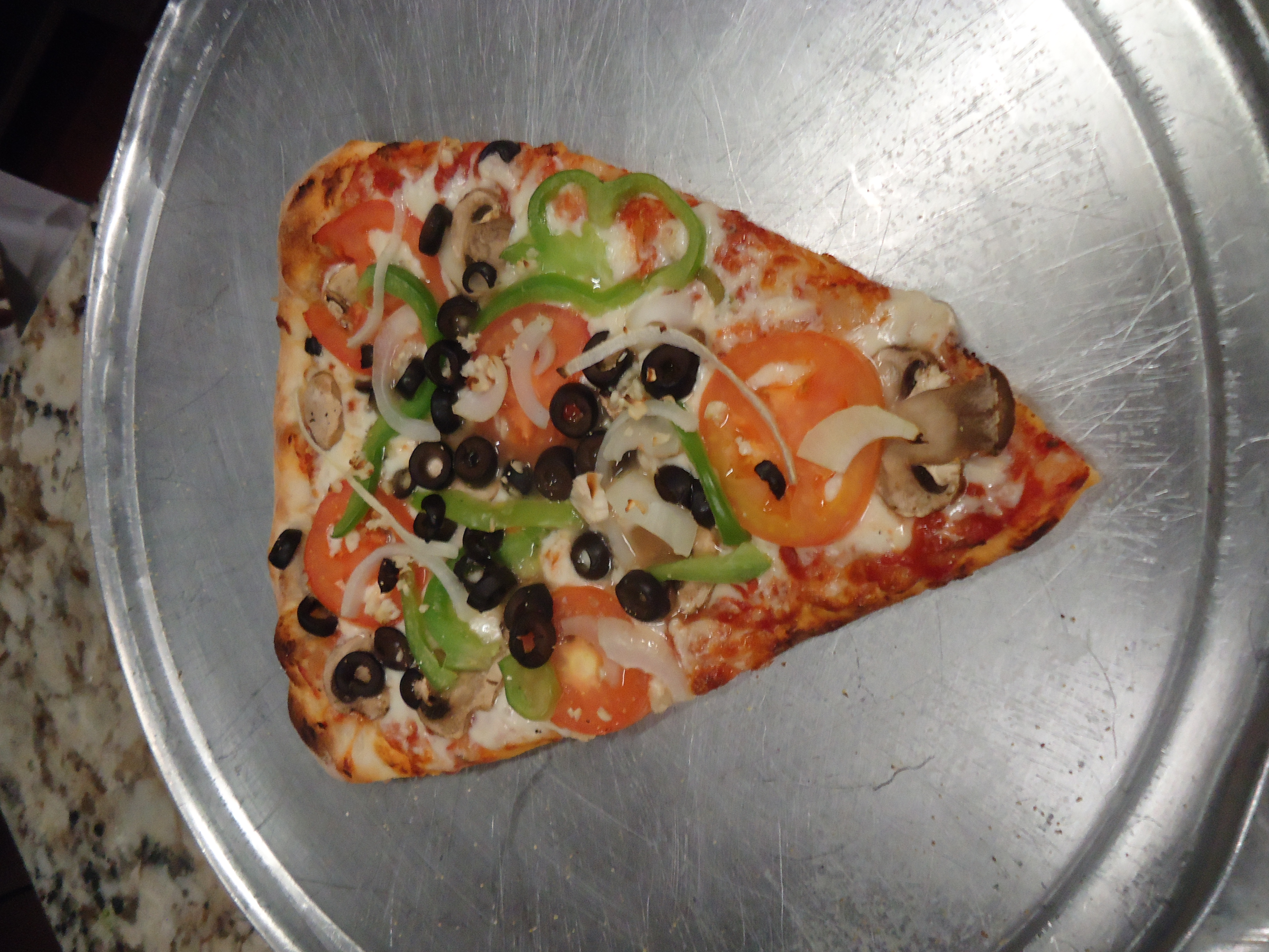 Order Veggie Deluxe Pizza Slice food online from Supreme pizza store, San Francisco on bringmethat.com